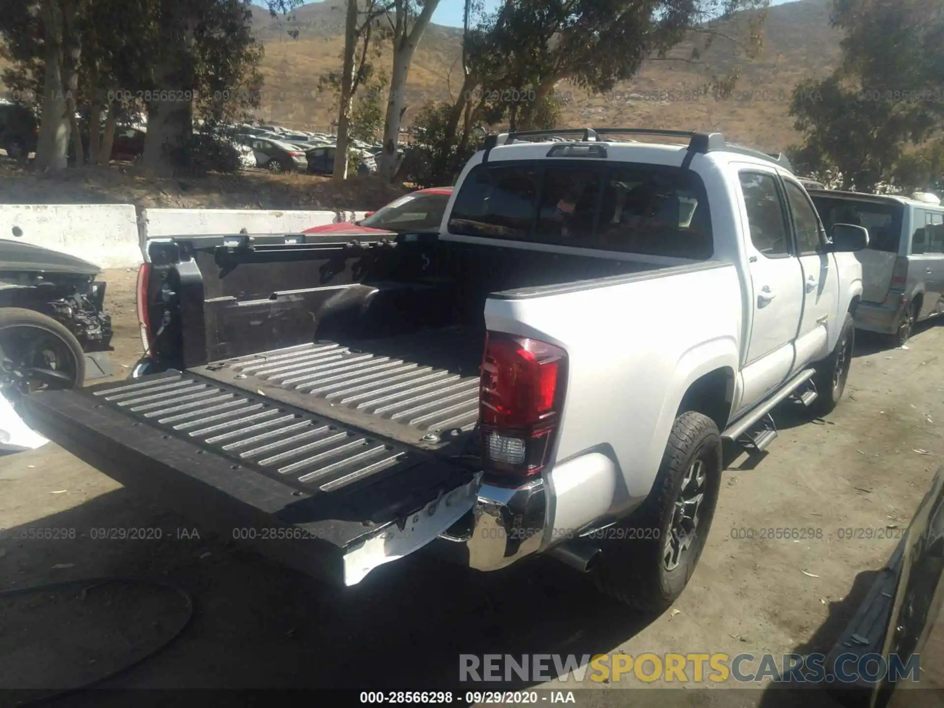 4 Photograph of a damaged car 5TFAX5GN2KX136185 TOYOTA TACOMA 2WD 2019