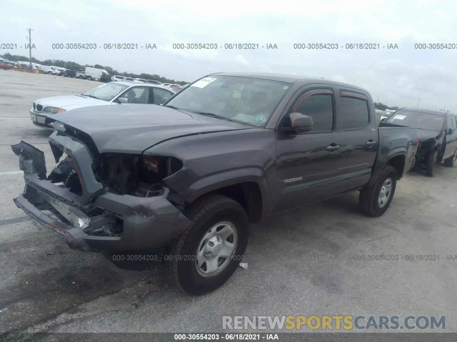 2 Photograph of a damaged car 5TFAX5GN2KX139250 TOYOTA TACOMA 2WD 2019