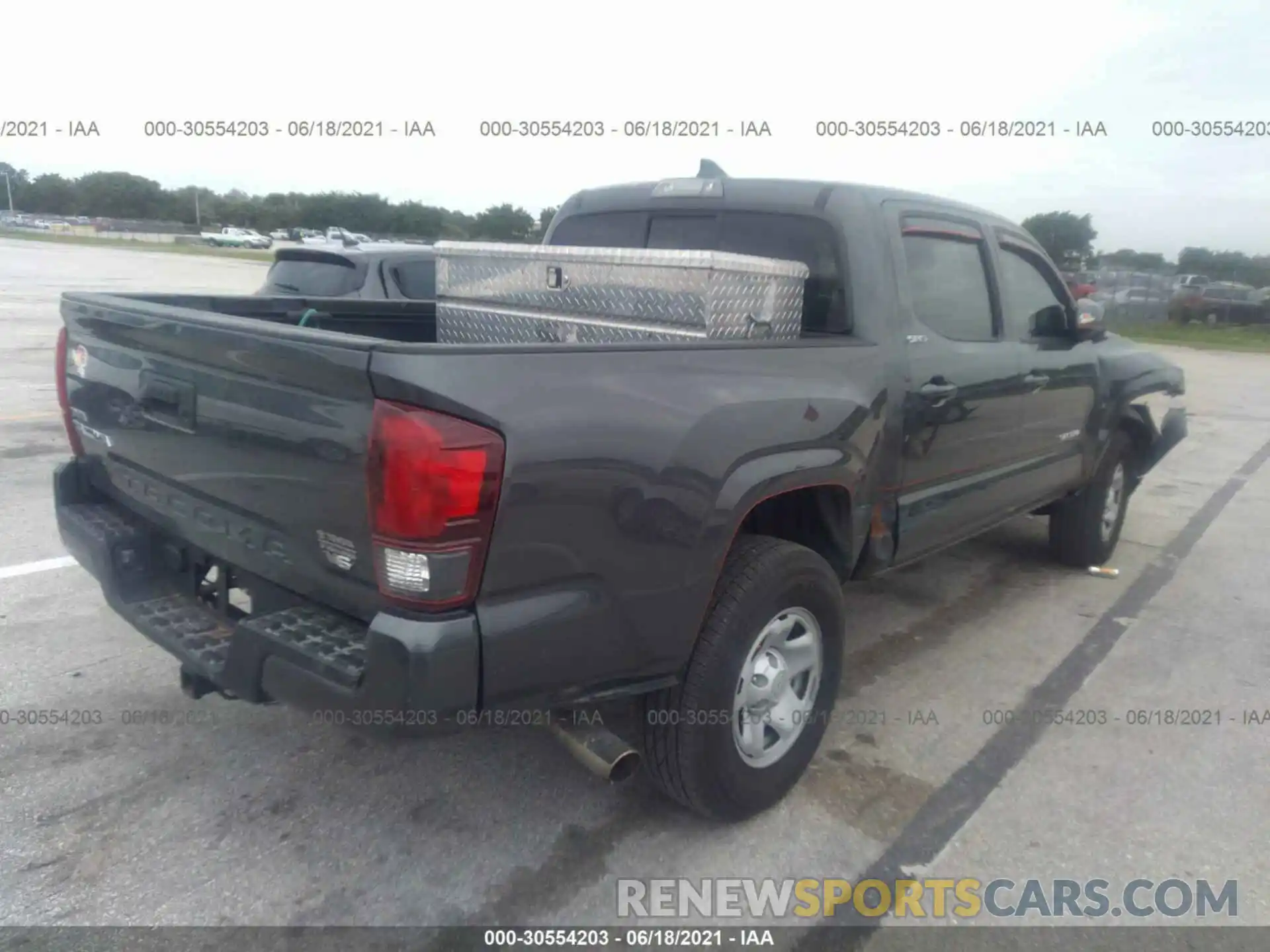 4 Photograph of a damaged car 5TFAX5GN2KX139250 TOYOTA TACOMA 2WD 2019