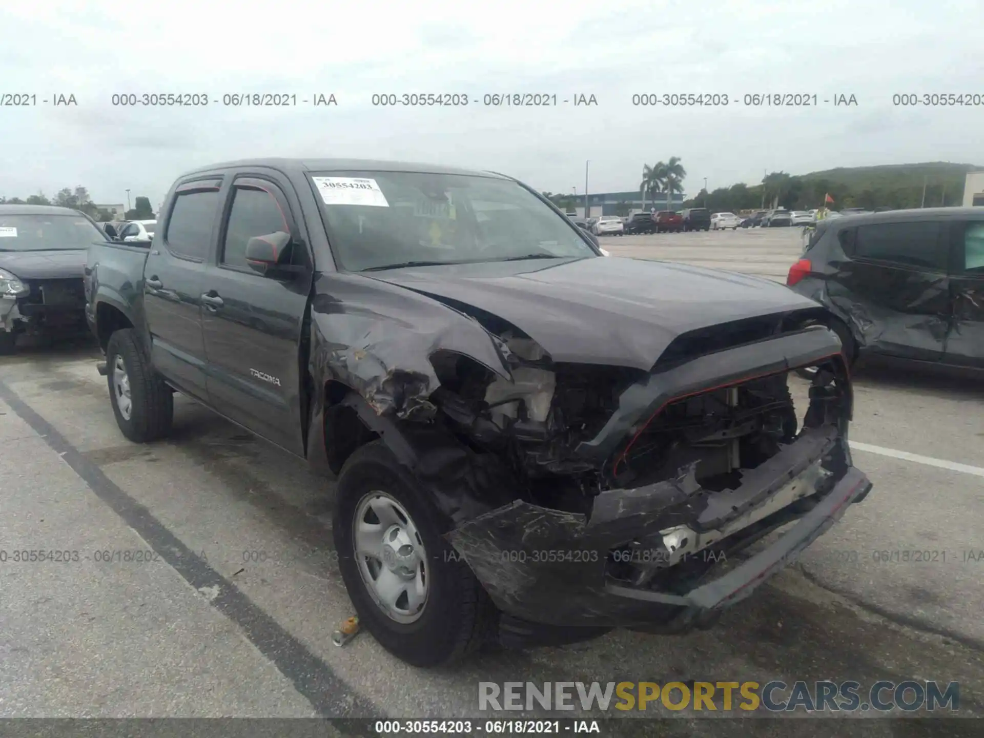 6 Photograph of a damaged car 5TFAX5GN2KX139250 TOYOTA TACOMA 2WD 2019