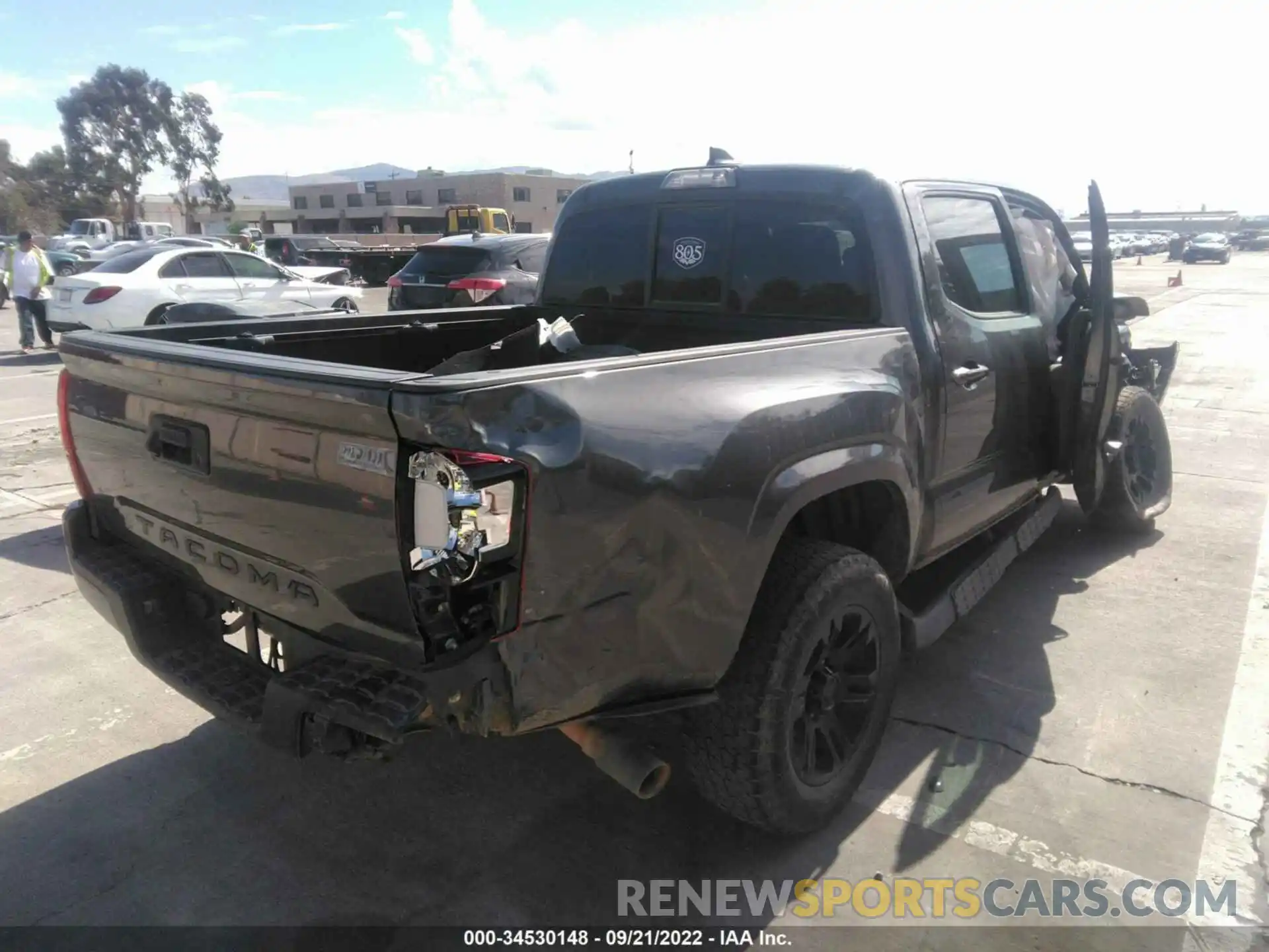 4 Photograph of a damaged car 5TFAX5GN2KX141421 TOYOTA TACOMA 2WD 2019