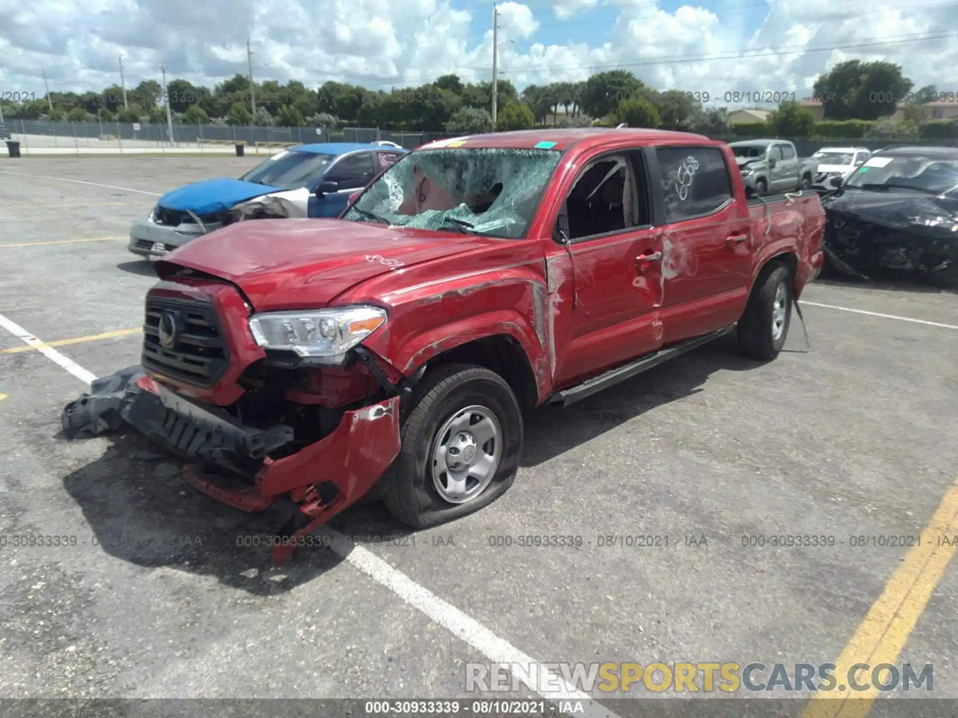 2 Photograph of a damaged car 5TFAX5GN2KX146568 TOYOTA TACOMA 2WD 2019