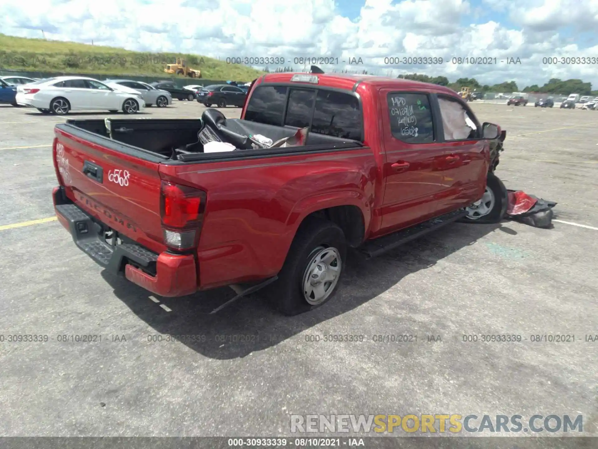 4 Photograph of a damaged car 5TFAX5GN2KX146568 TOYOTA TACOMA 2WD 2019