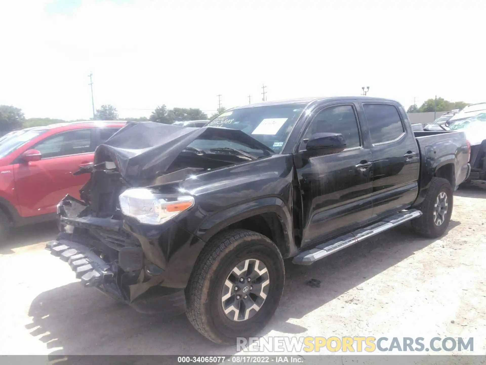 2 Photograph of a damaged car 5TFAX5GN3KX134431 TOYOTA TACOMA 2WD 2019