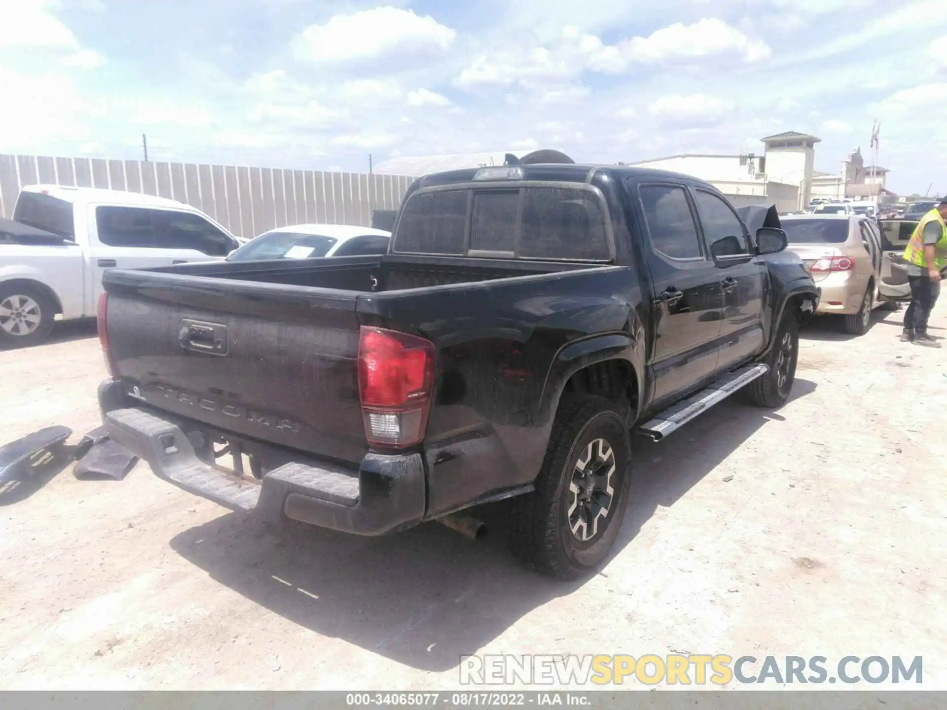 4 Photograph of a damaged car 5TFAX5GN3KX134431 TOYOTA TACOMA 2WD 2019