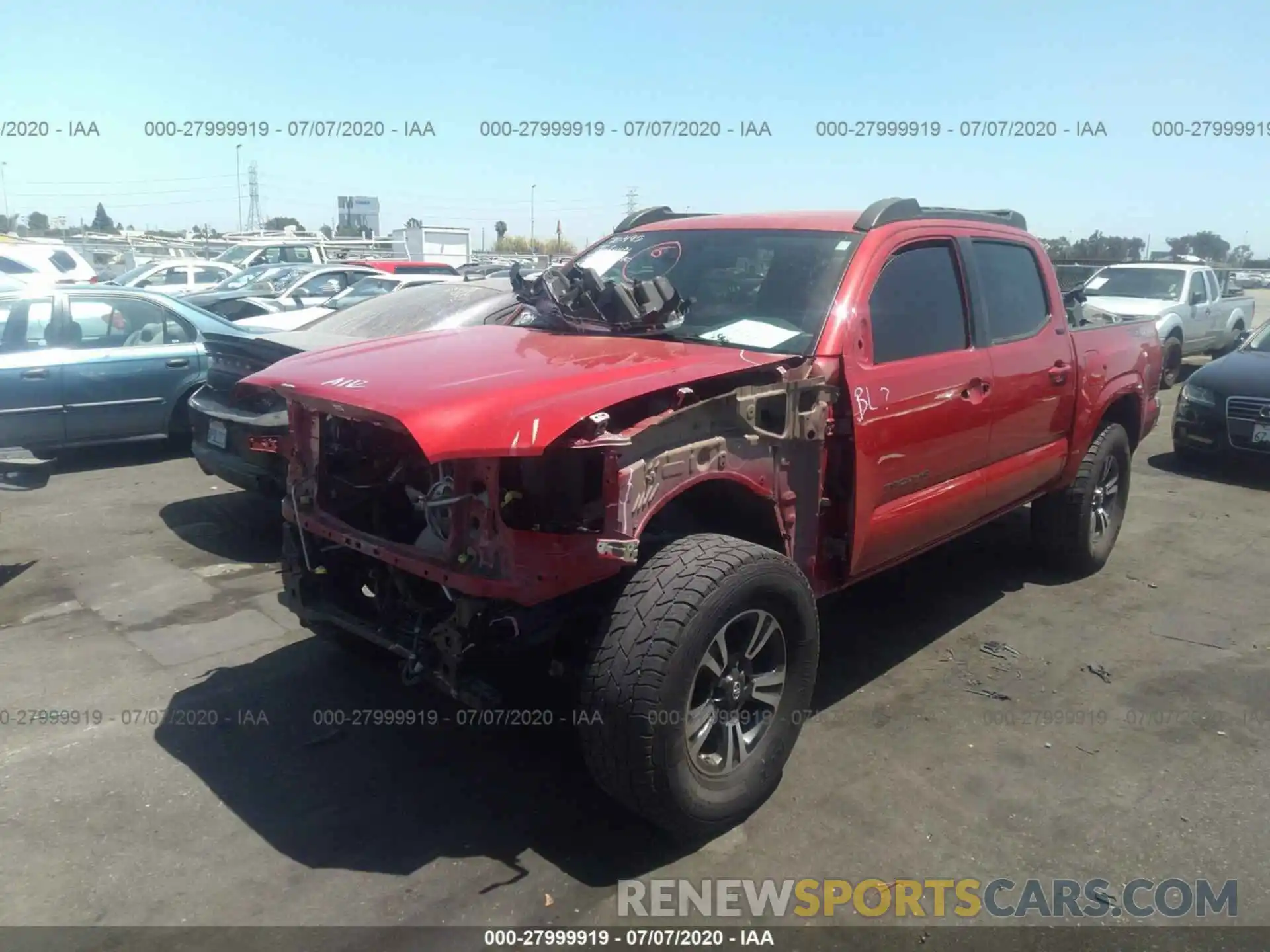 2 Photograph of a damaged car 5TFAX5GN3KX136809 TOYOTA TACOMA 2WD 2019