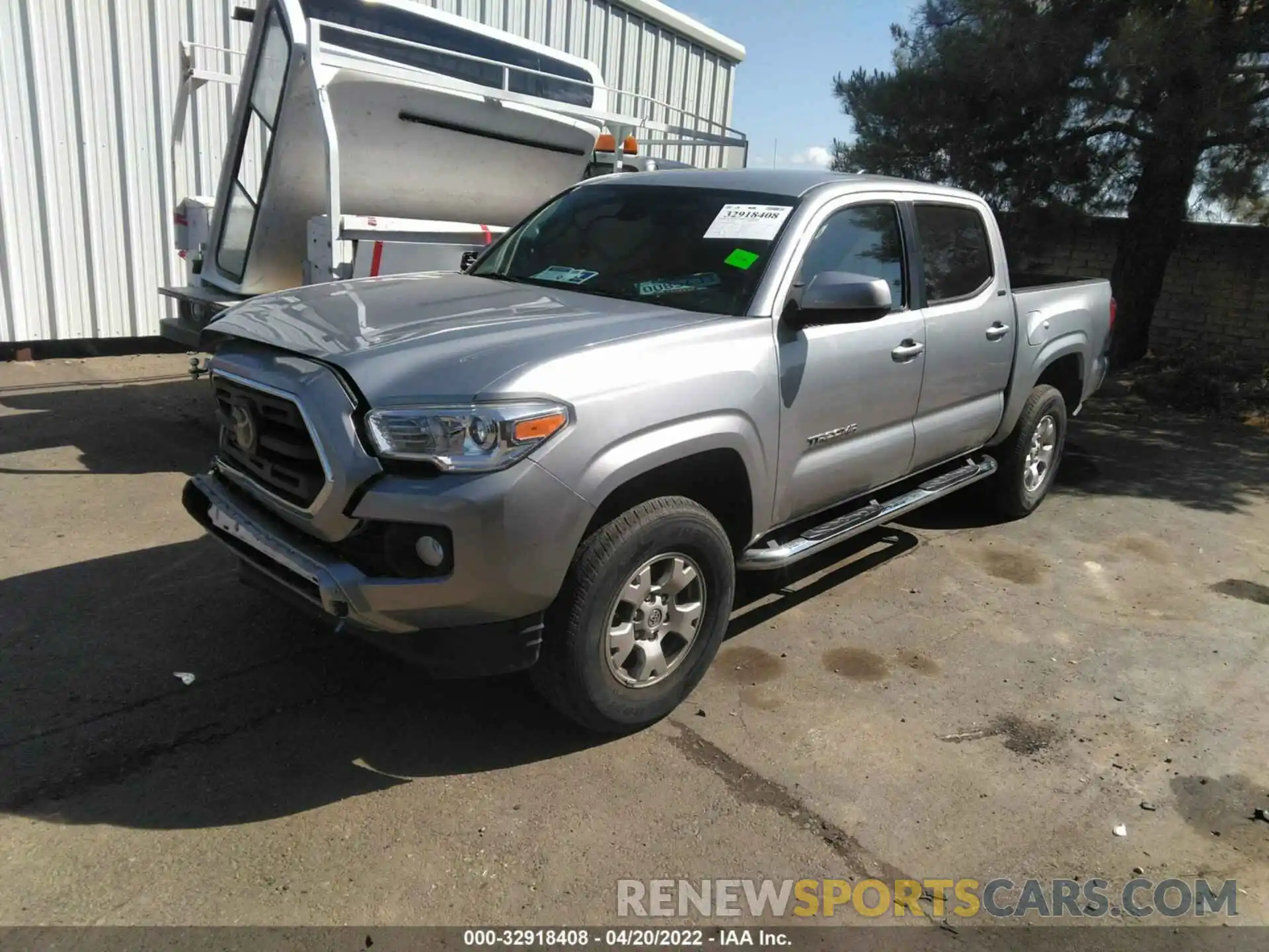 2 Photograph of a damaged car 5TFAX5GN3KX142688 TOYOTA TACOMA 2WD 2019