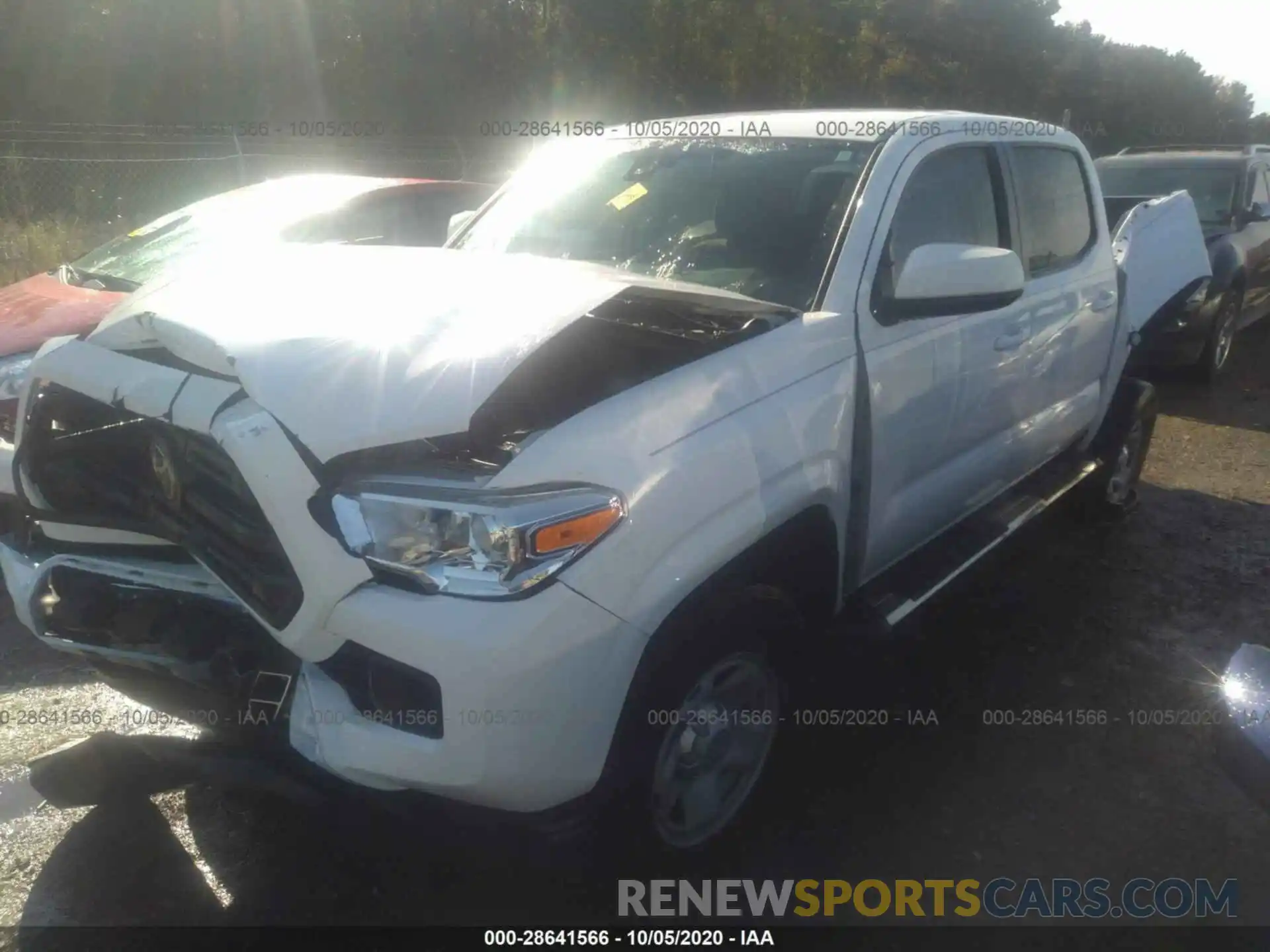 2 Photograph of a damaged car 5TFAX5GN3KX144182 TOYOTA TACOMA 2WD 2019