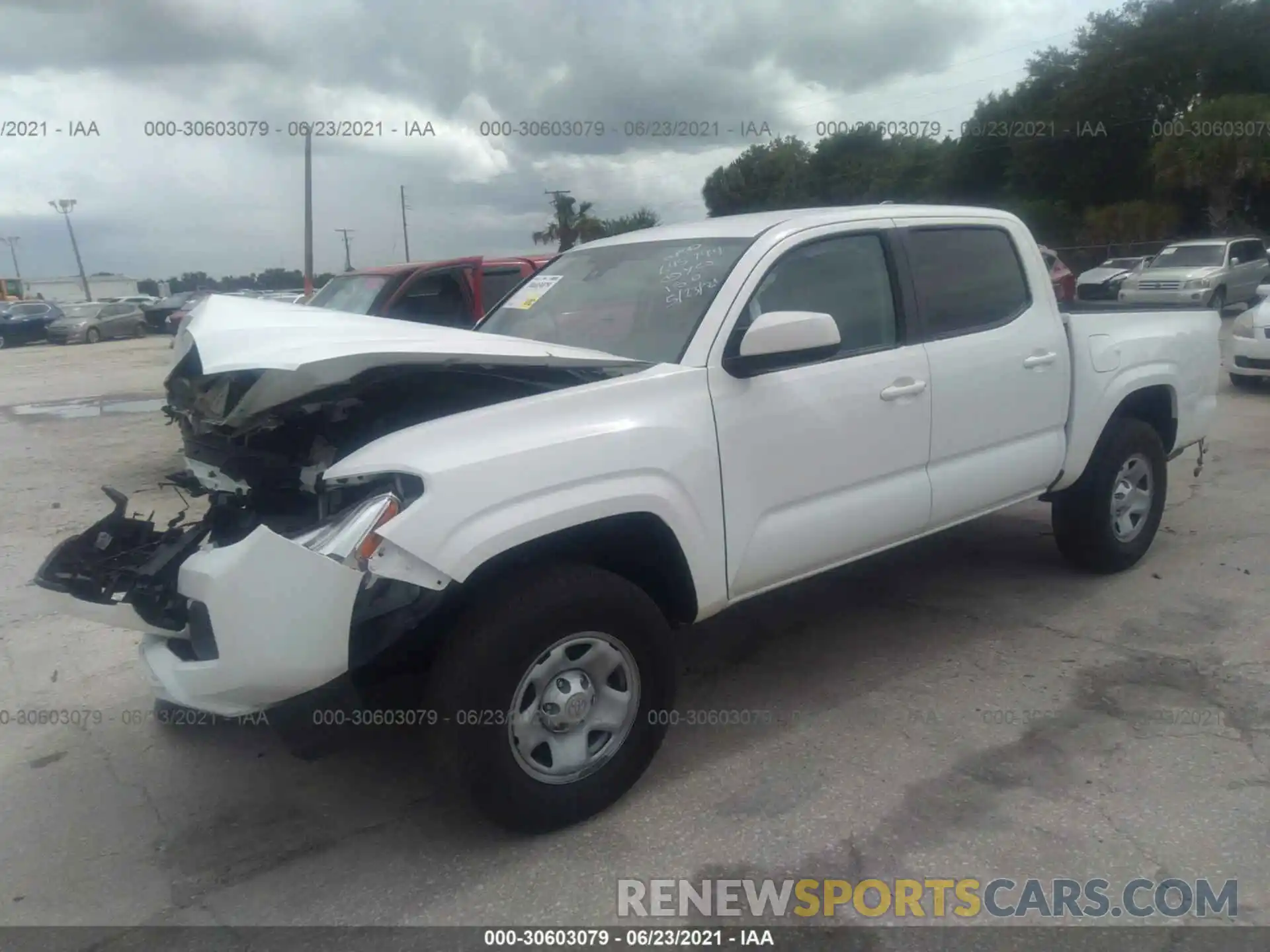 2 Photograph of a damaged car 5TFAX5GN3KX147275 TOYOTA TACOMA 2WD 2019