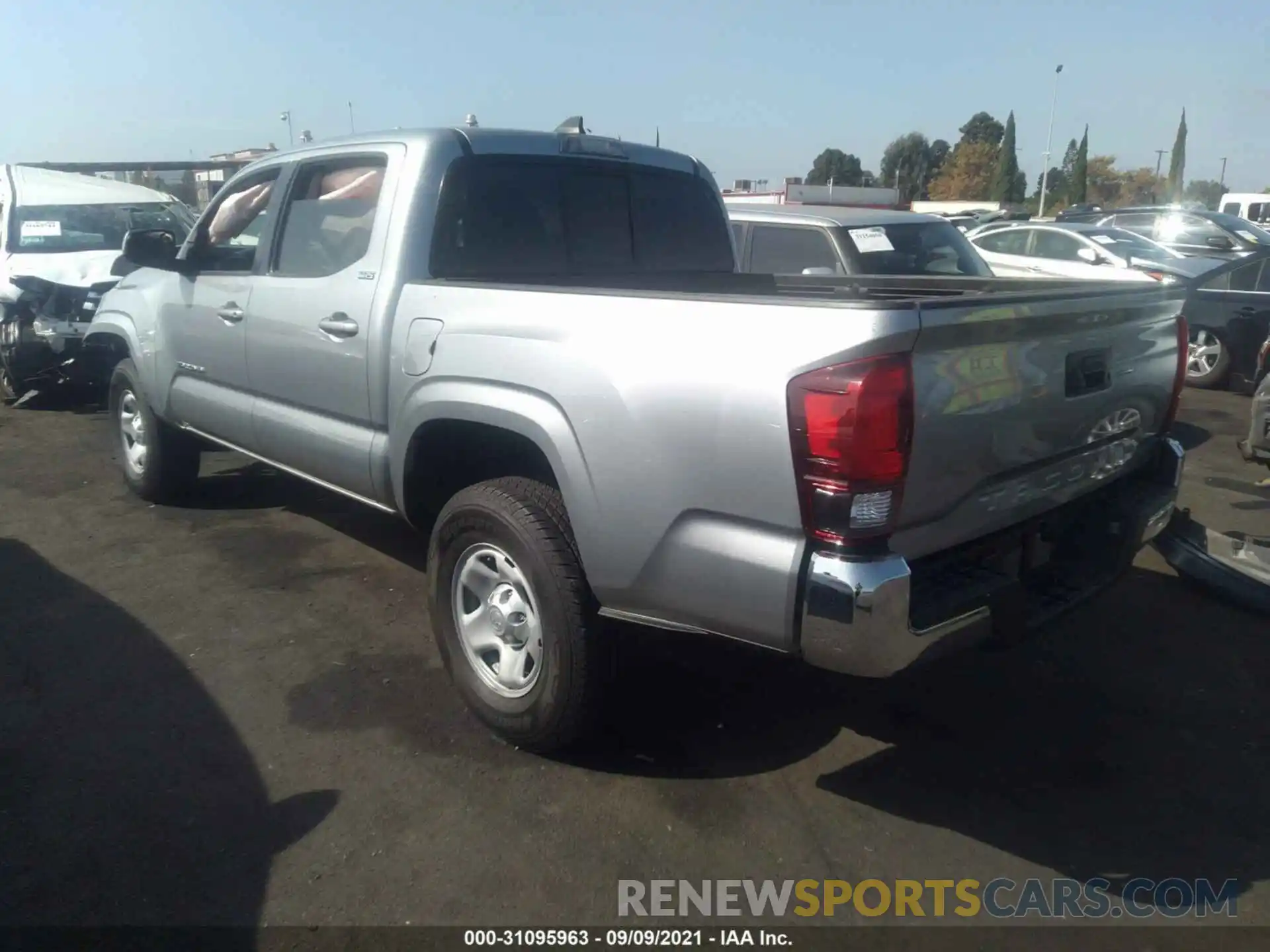 3 Photograph of a damaged car 5TFAX5GN3KX149396 TOYOTA TACOMA 2WD 2019