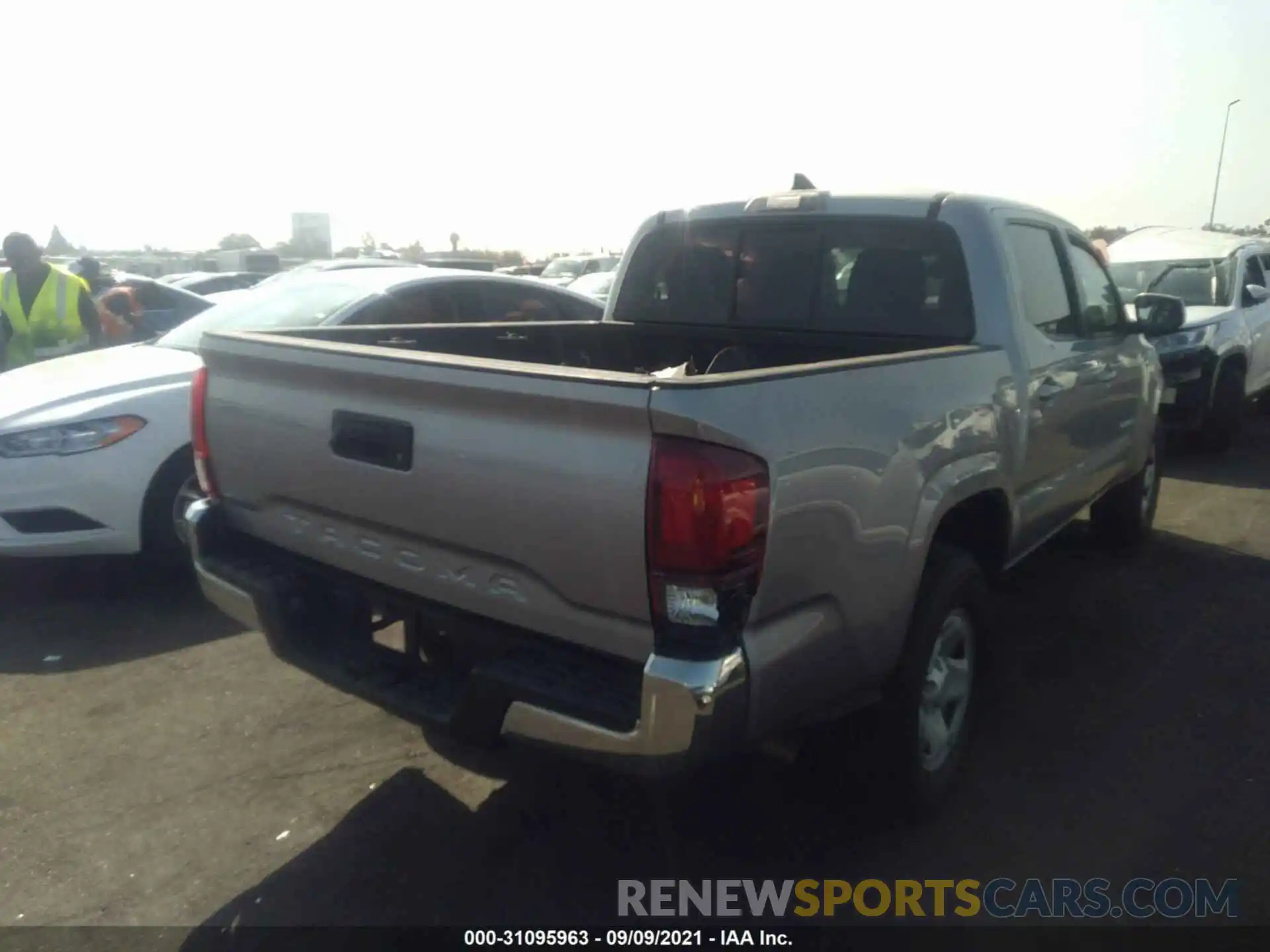 4 Photograph of a damaged car 5TFAX5GN3KX149396 TOYOTA TACOMA 2WD 2019