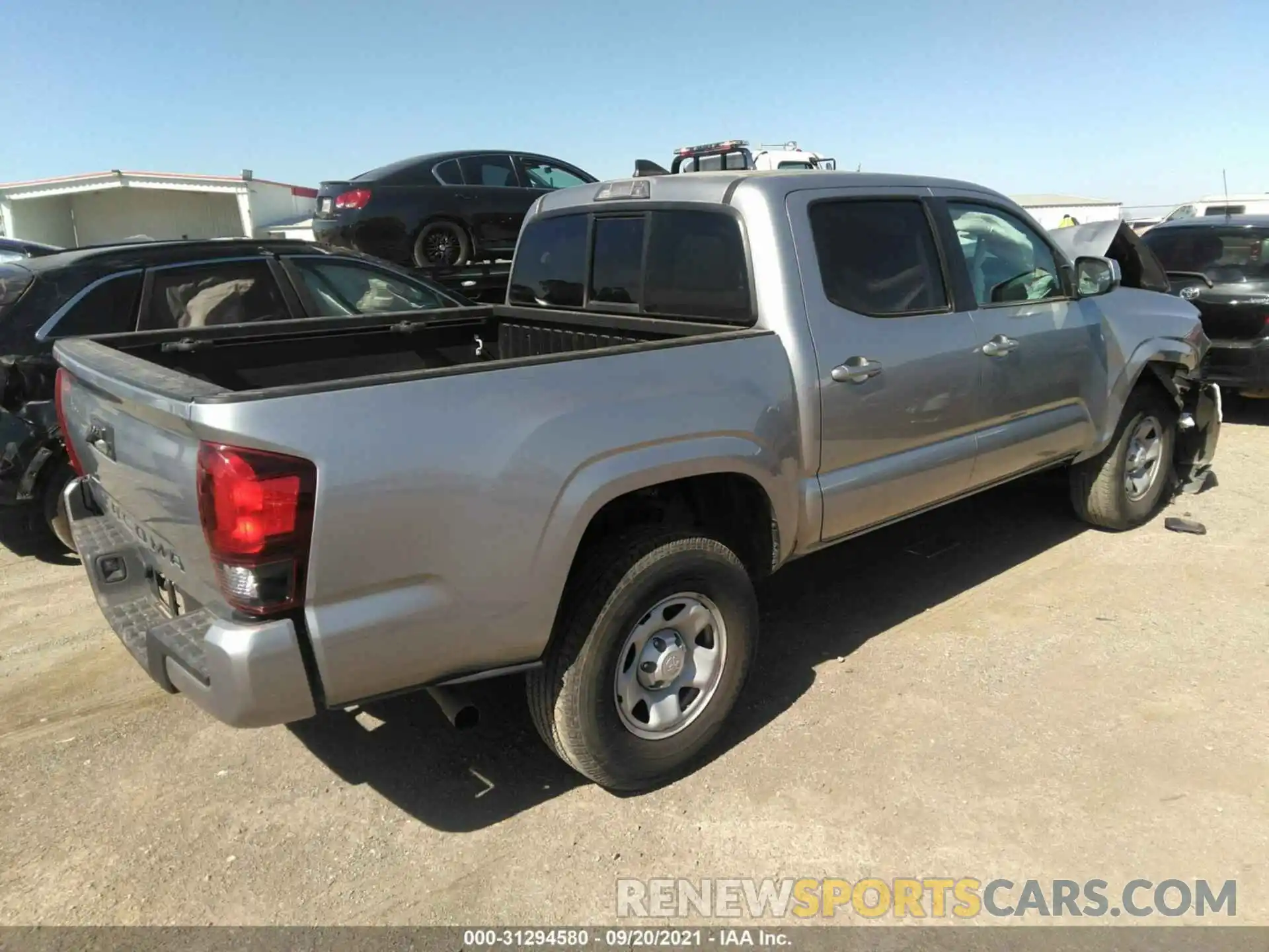 4 Photograph of a damaged car 5TFAX5GN3KX157448 TOYOTA TACOMA 2WD 2019