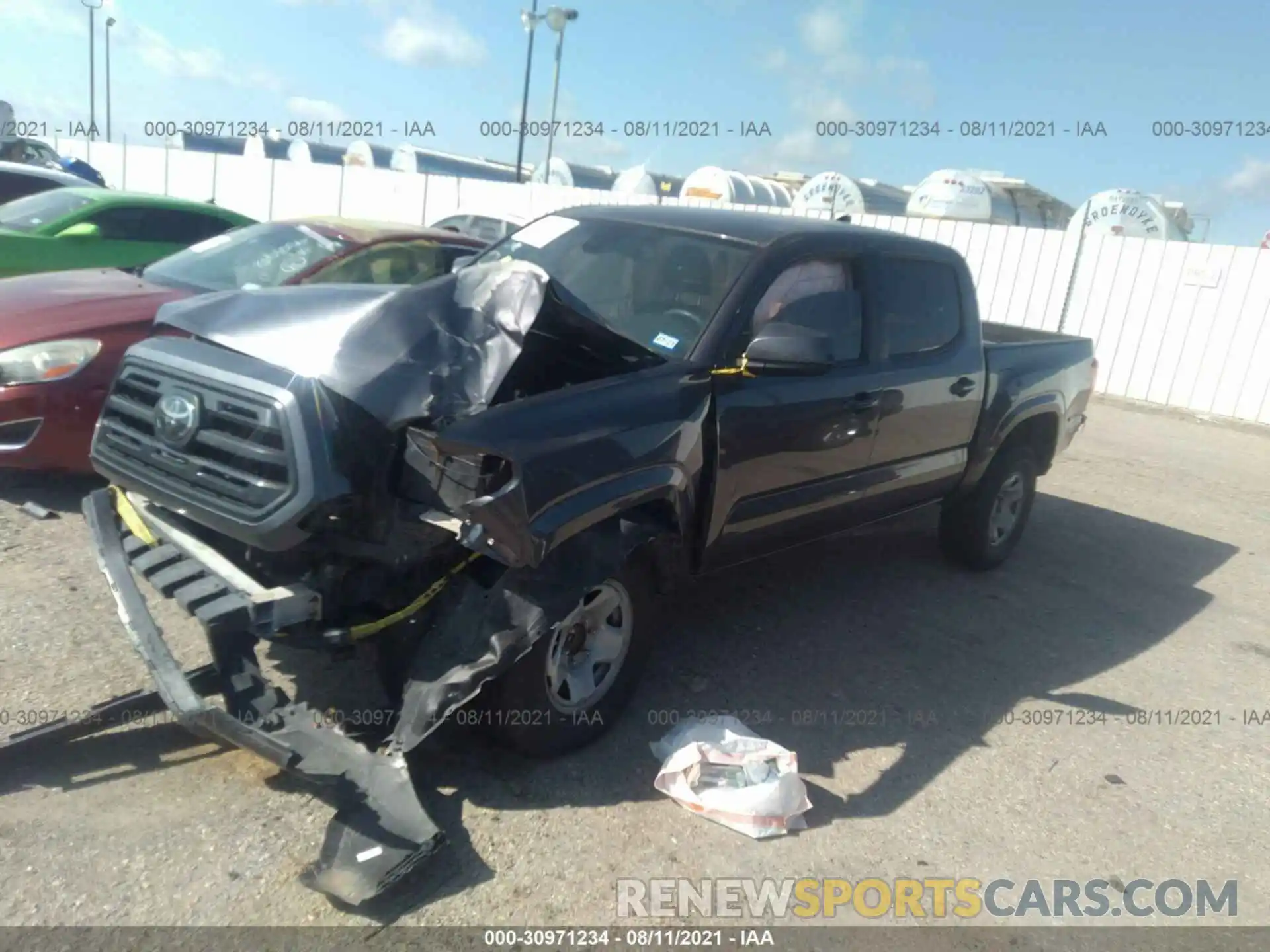 2 Photograph of a damaged car 5TFAX5GN3KX159247 TOYOTA TACOMA 2WD 2019