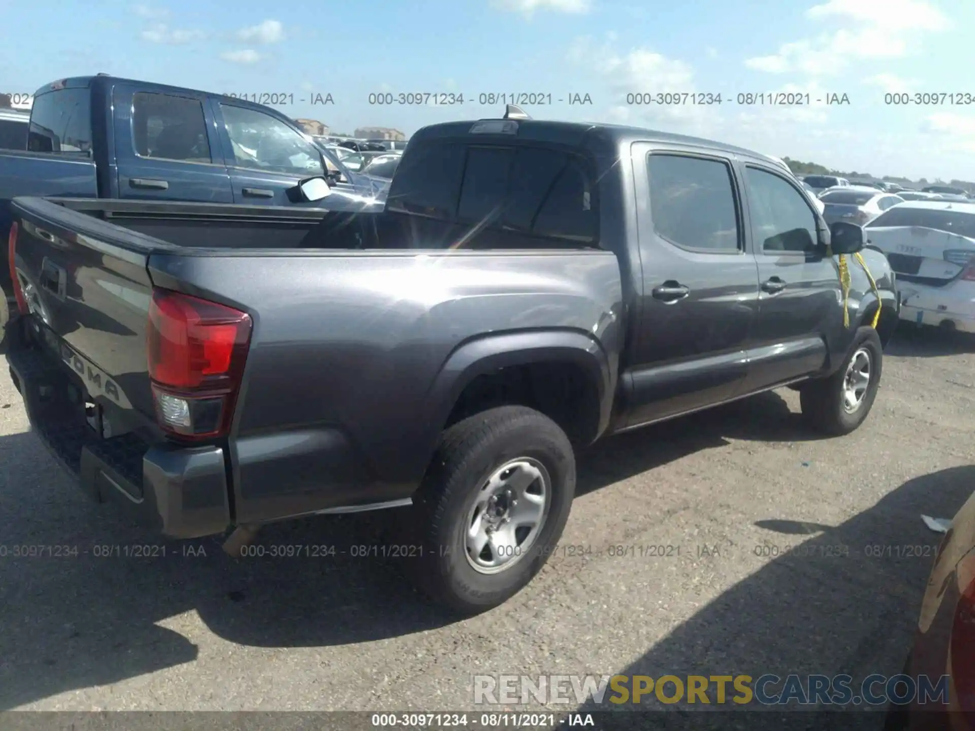 4 Photograph of a damaged car 5TFAX5GN3KX159247 TOYOTA TACOMA 2WD 2019