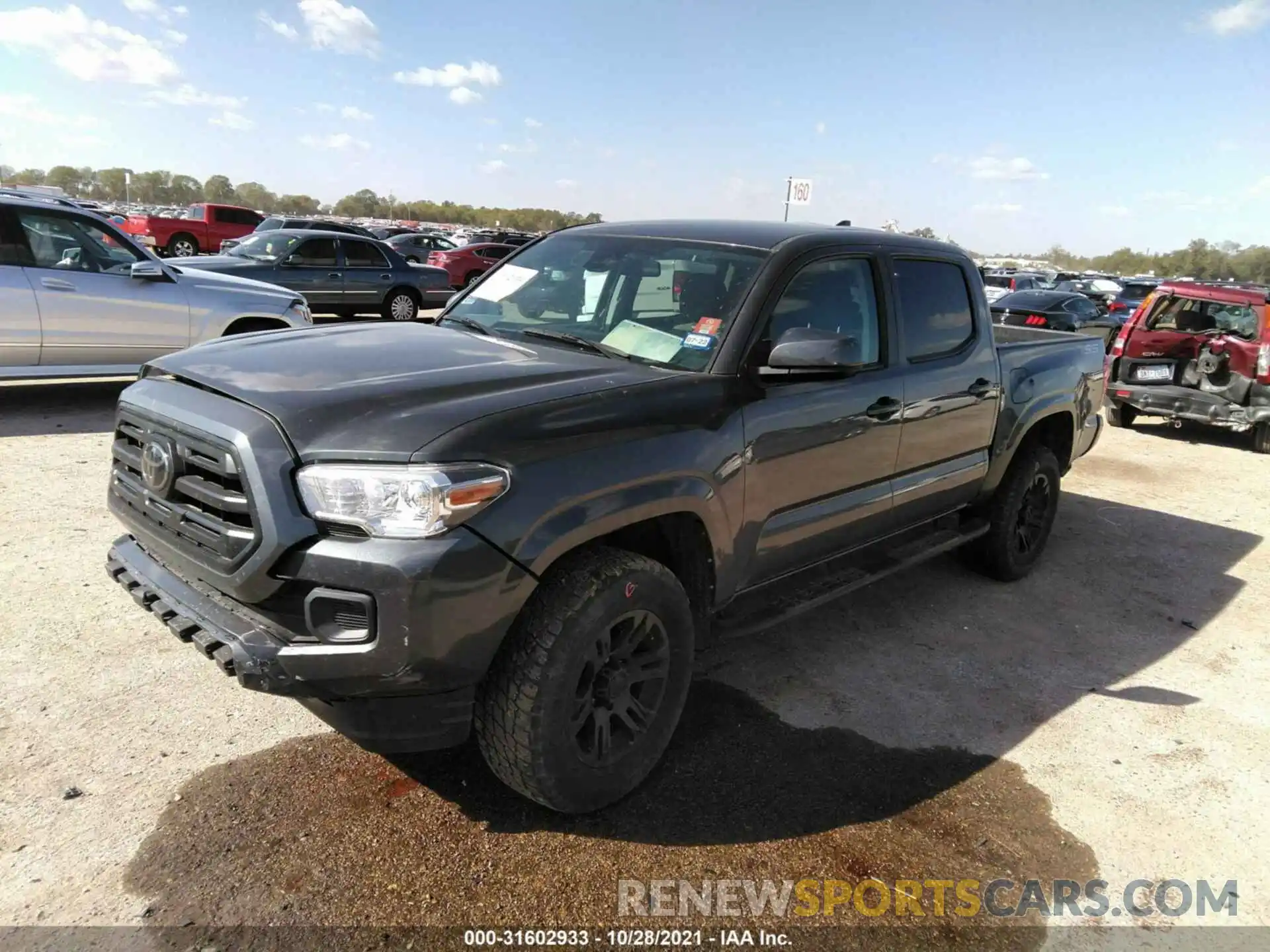 2 Photograph of a damaged car 5TFAX5GN3KX161483 TOYOTA TACOMA 2WD 2019