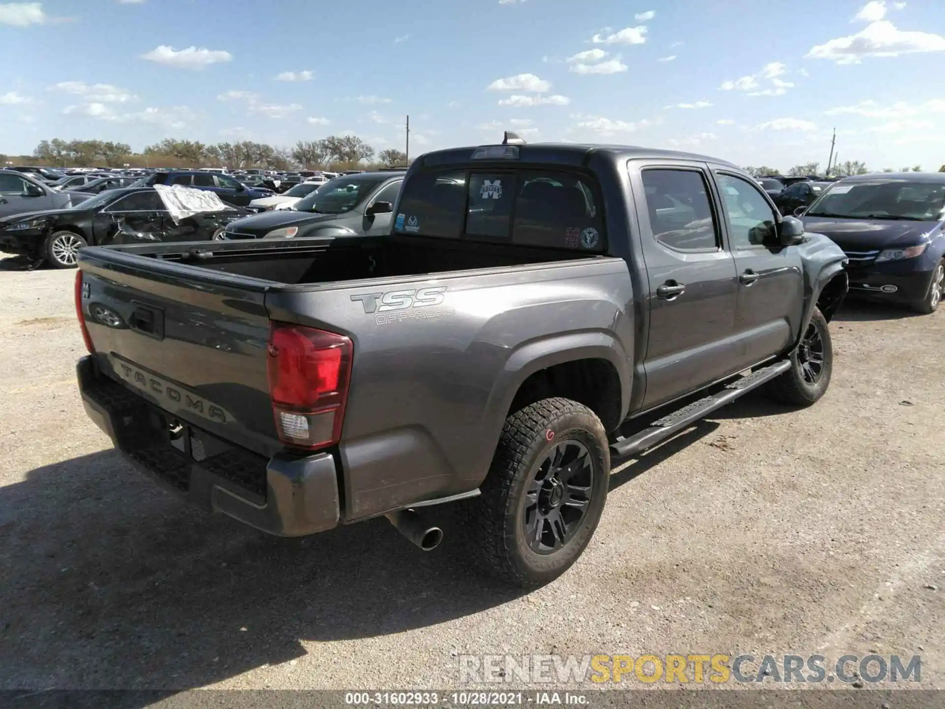 4 Photograph of a damaged car 5TFAX5GN3KX161483 TOYOTA TACOMA 2WD 2019