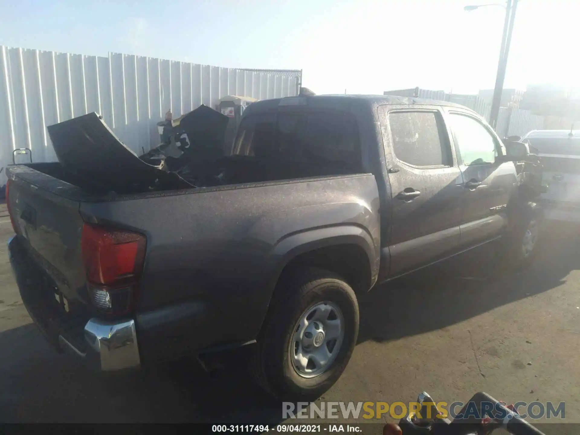 4 Photograph of a damaged car 5TFAX5GN4KX132901 TOYOTA TACOMA 2WD 2019