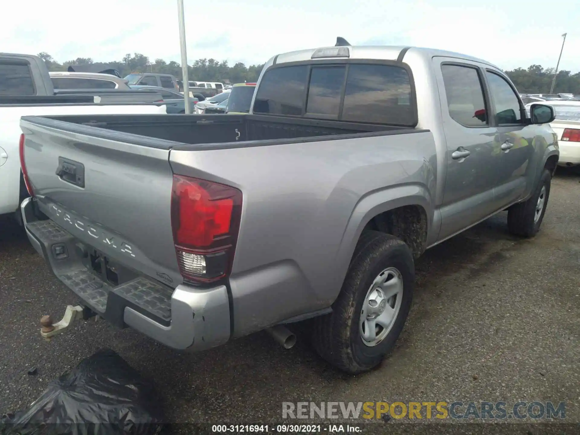 4 Photograph of a damaged car 5TFAX5GN4KX135040 TOYOTA TACOMA 2WD 2019