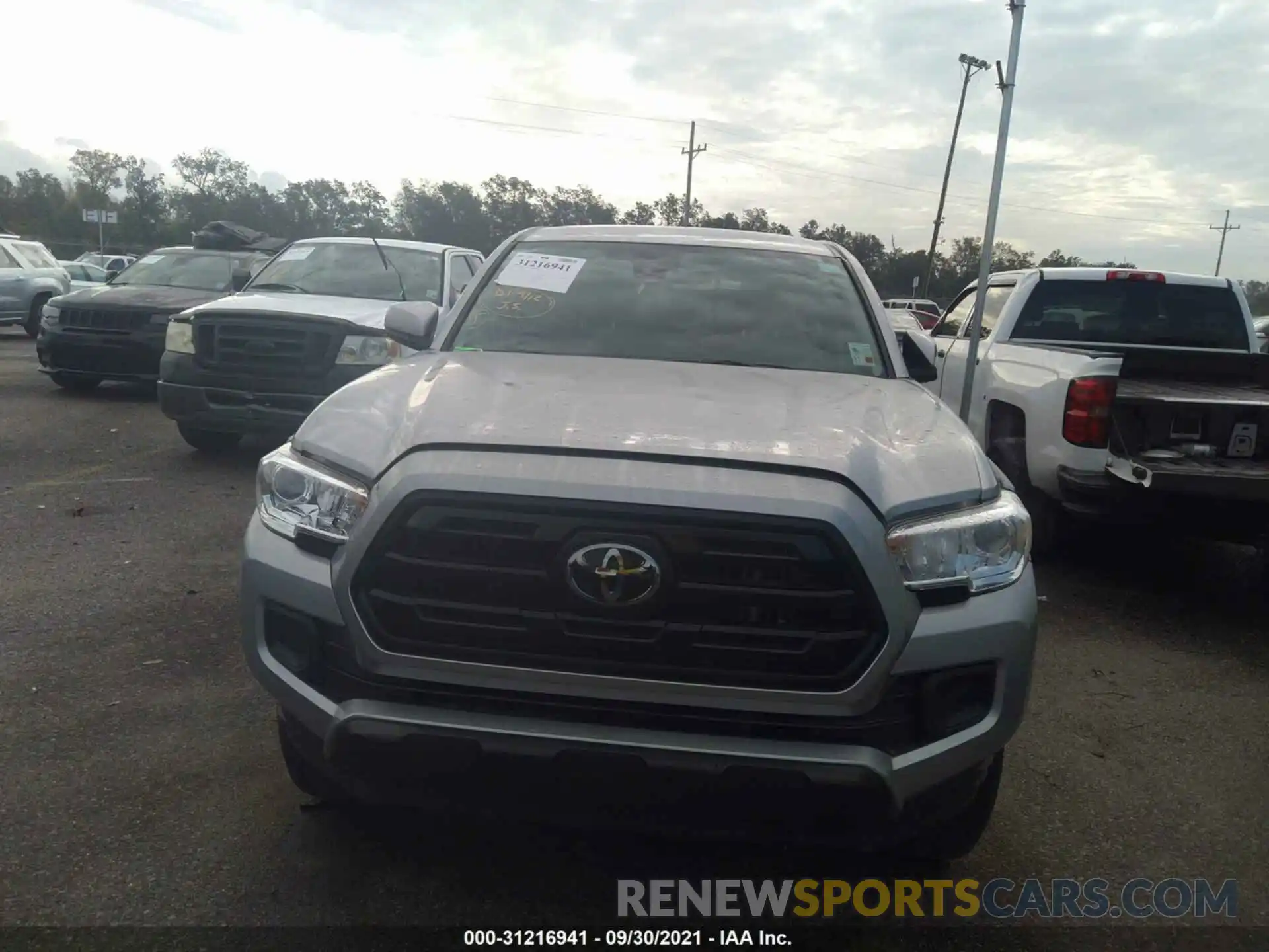 6 Photograph of a damaged car 5TFAX5GN4KX135040 TOYOTA TACOMA 2WD 2019