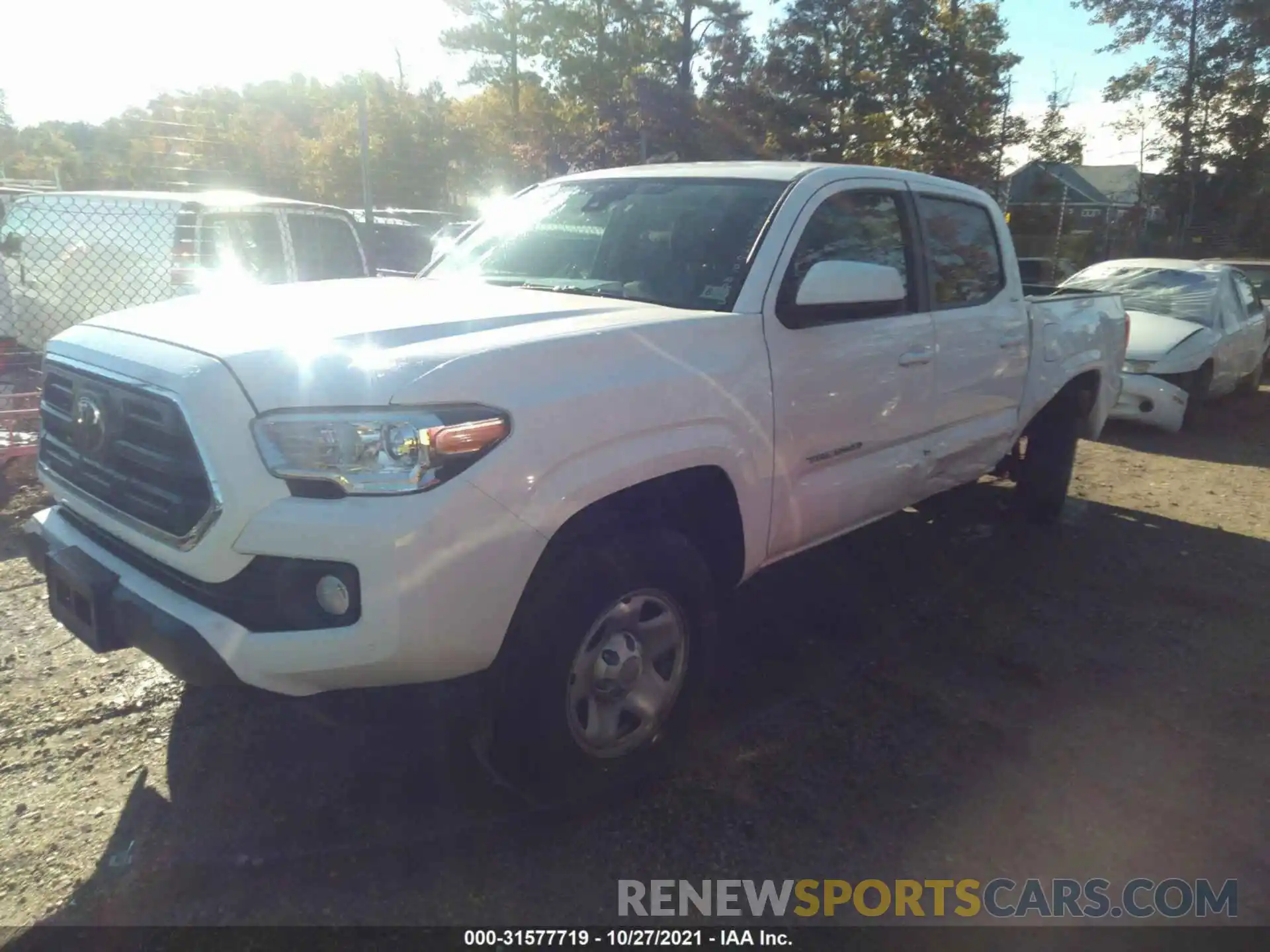 2 Photograph of a damaged car 5TFAX5GN4KX144658 TOYOTA TACOMA 2WD 2019