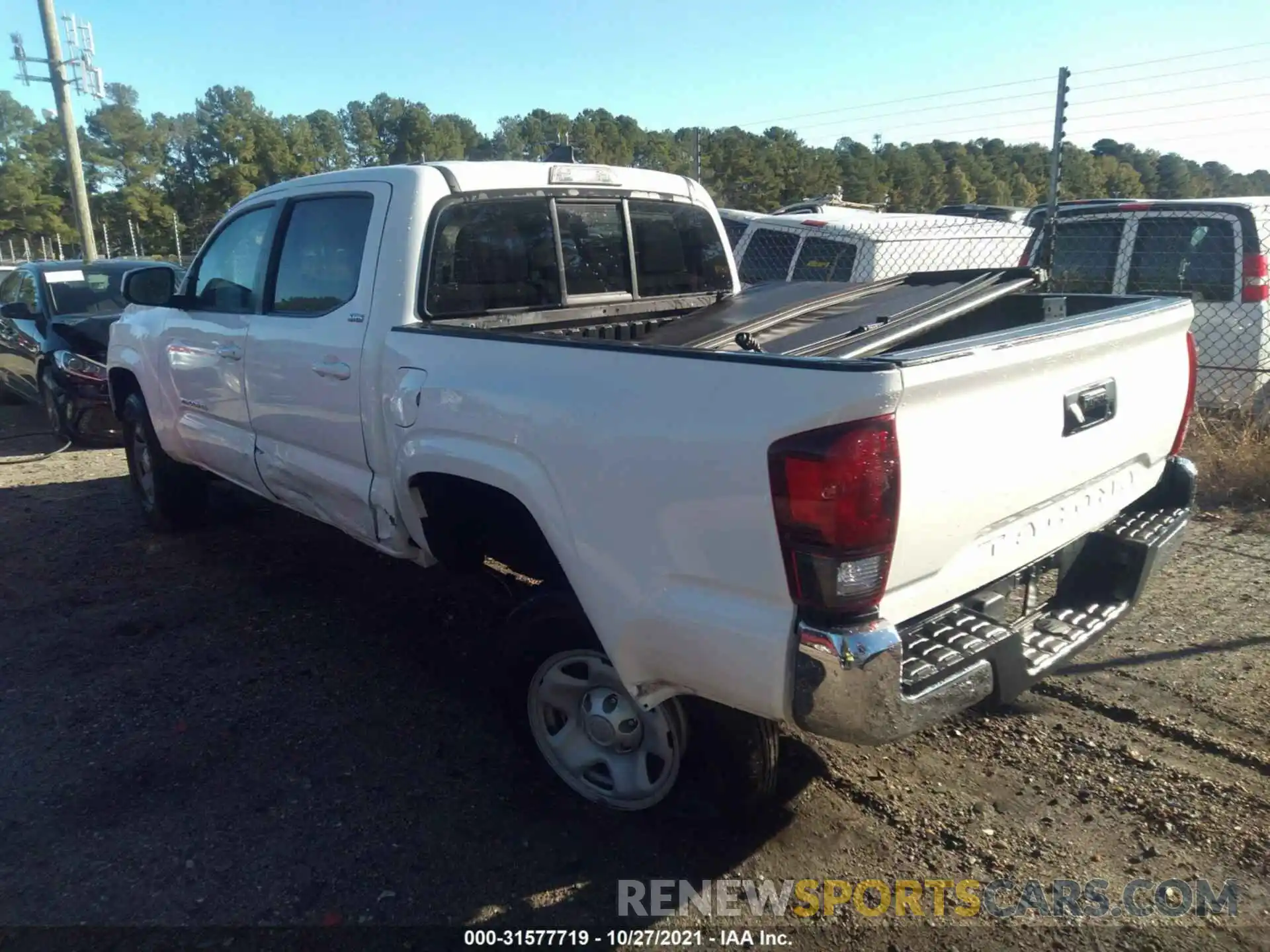 3 Photograph of a damaged car 5TFAX5GN4KX144658 TOYOTA TACOMA 2WD 2019