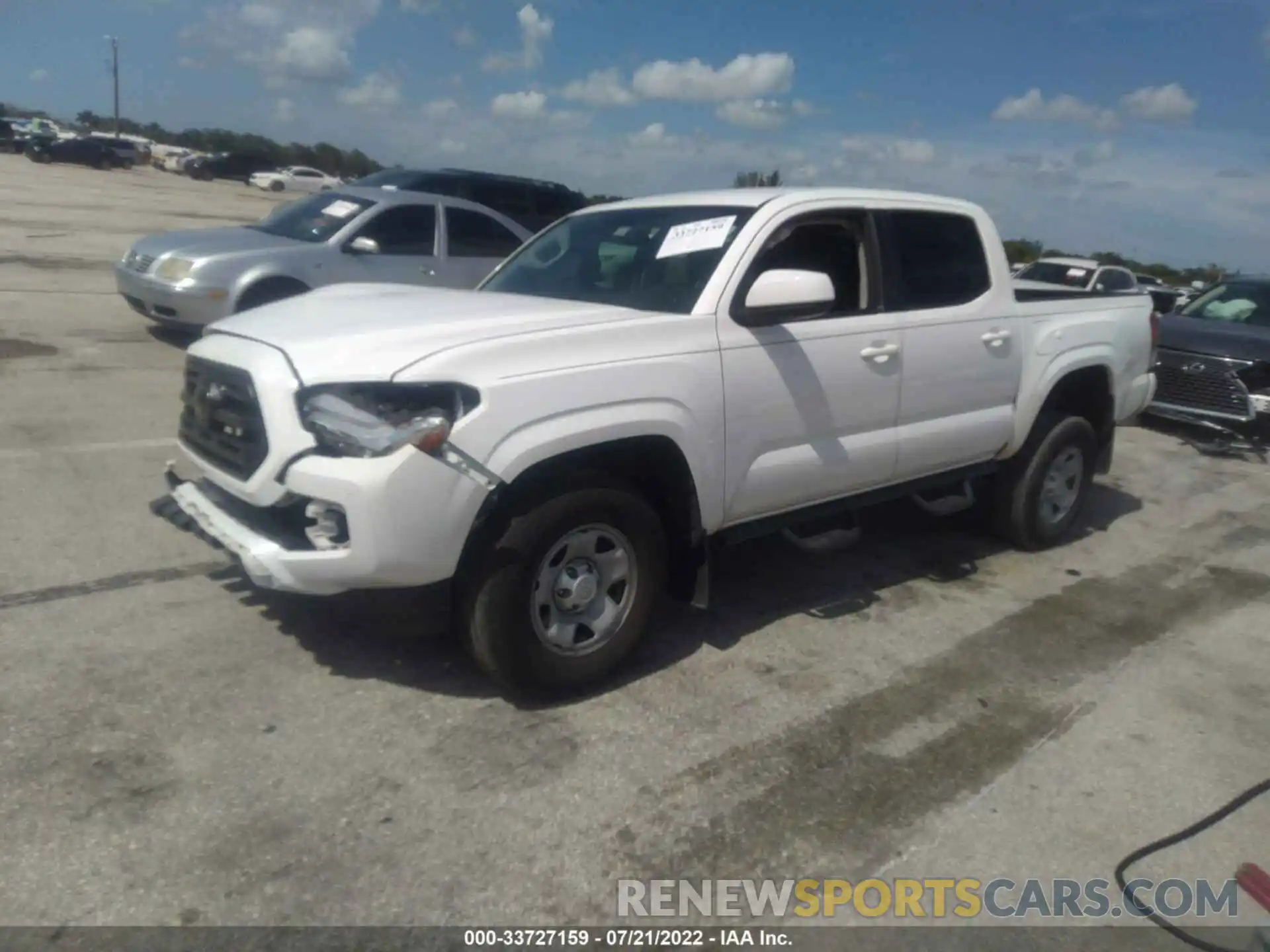 2 Photograph of a damaged car 5TFAX5GN4KX147544 TOYOTA TACOMA 2WD 2019