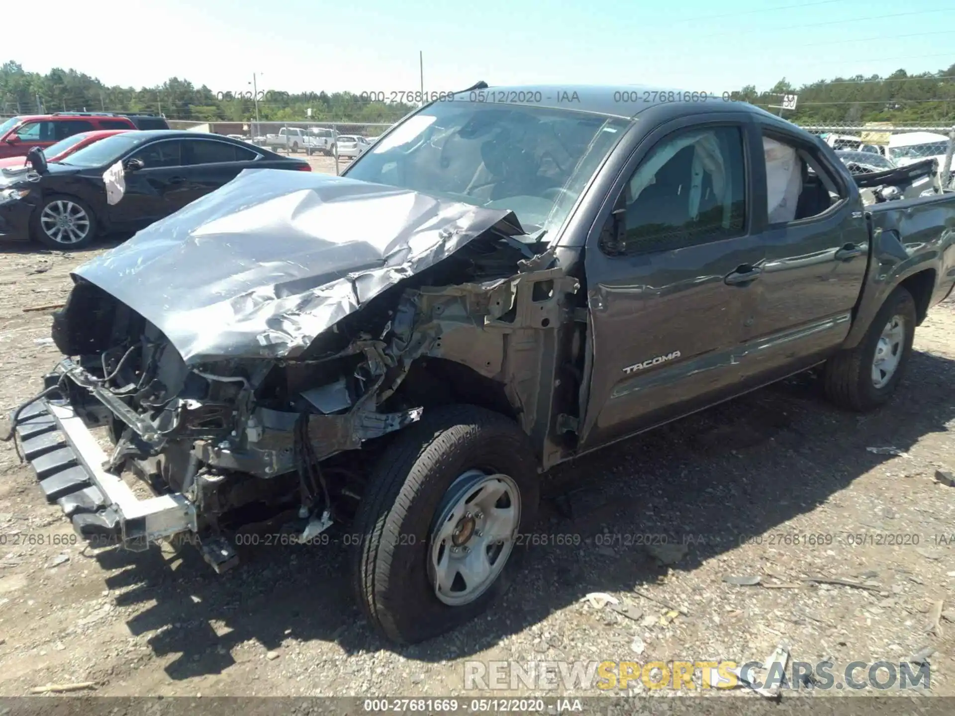 2 Photograph of a damaged car 5TFAX5GN4KX147897 TOYOTA TACOMA 2WD 2019