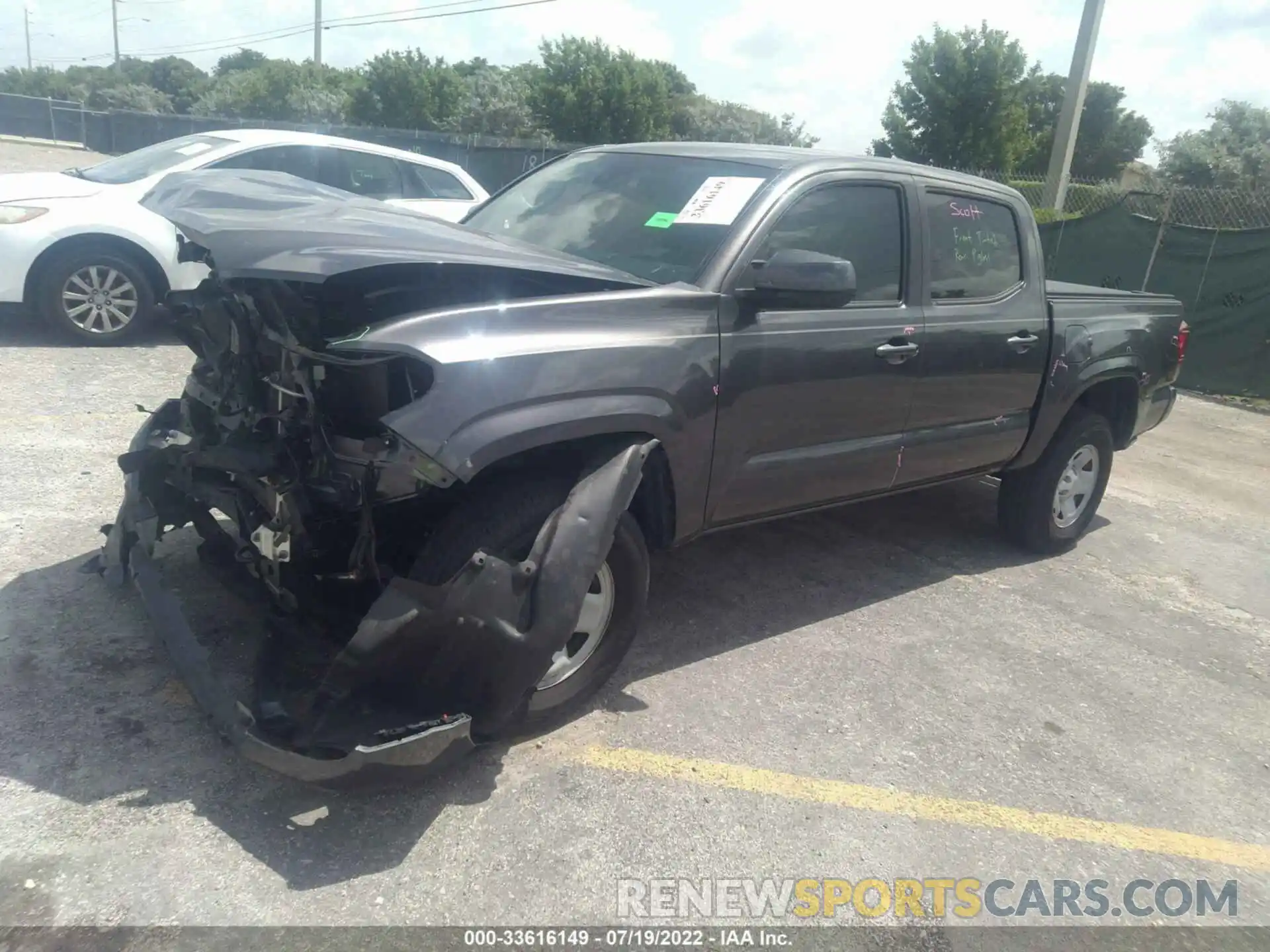 2 Photograph of a damaged car 5TFAX5GN4KX148841 TOYOTA TACOMA 2WD 2019