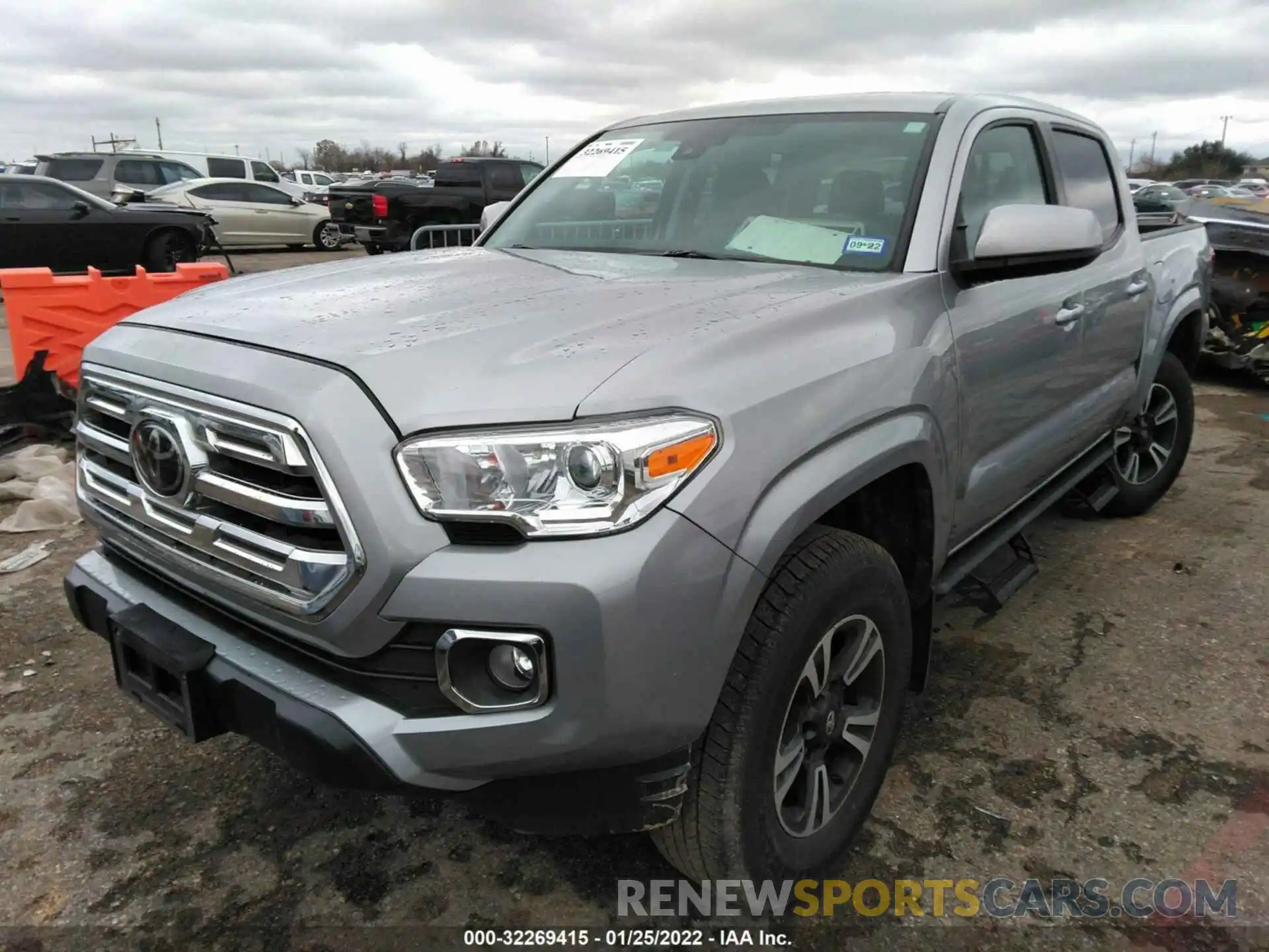 2 Photograph of a damaged car 5TFAX5GN5KX138366 TOYOTA TACOMA 2WD 2019