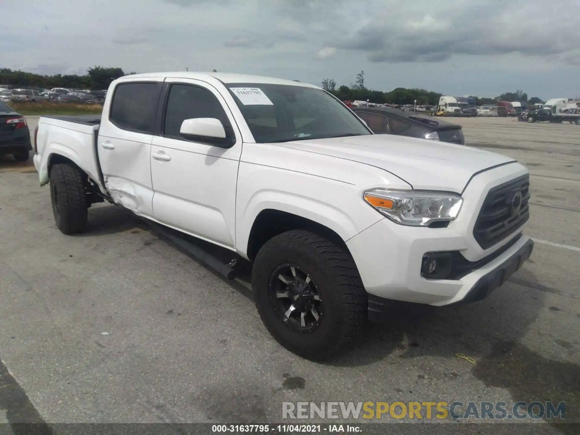 1 Photograph of a damaged car 5TFAX5GN5KX145625 TOYOTA TACOMA 2WD 2019