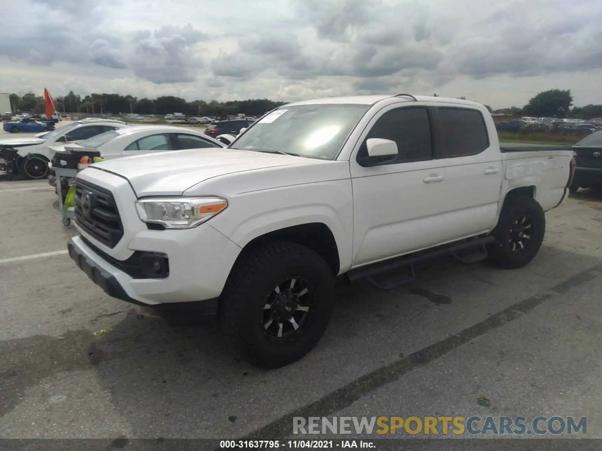 2 Photograph of a damaged car 5TFAX5GN5KX145625 TOYOTA TACOMA 2WD 2019