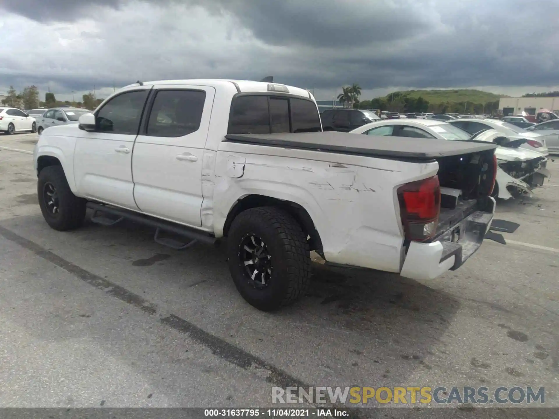 3 Photograph of a damaged car 5TFAX5GN5KX145625 TOYOTA TACOMA 2WD 2019