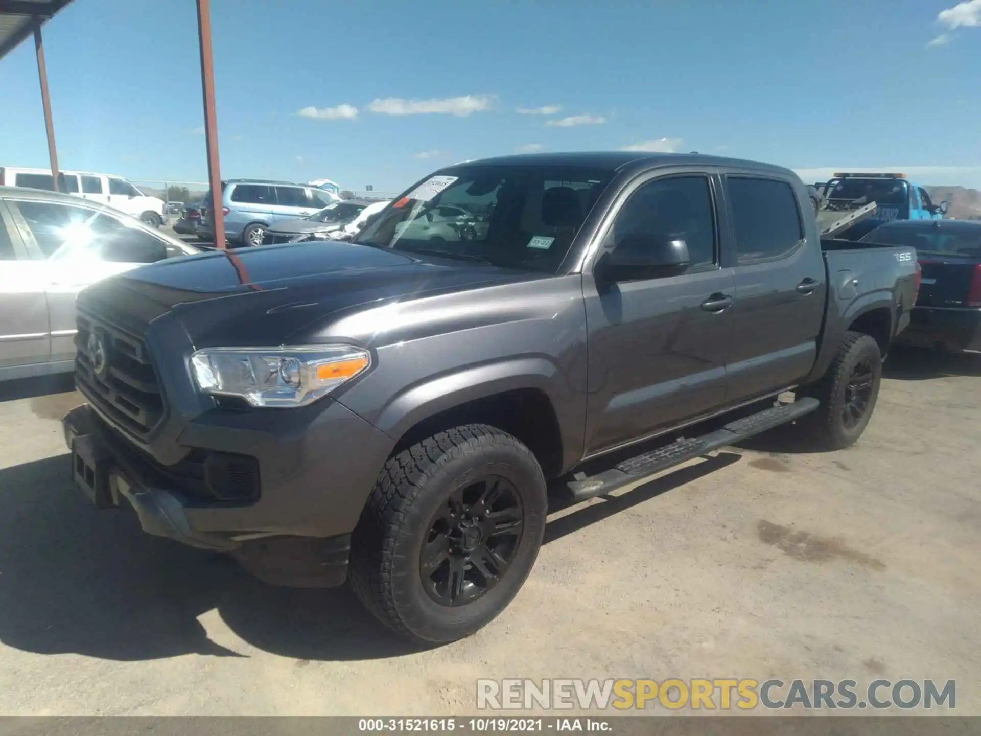 2 Photograph of a damaged car 5TFAX5GN5KX149402 TOYOTA TACOMA 2WD 2019