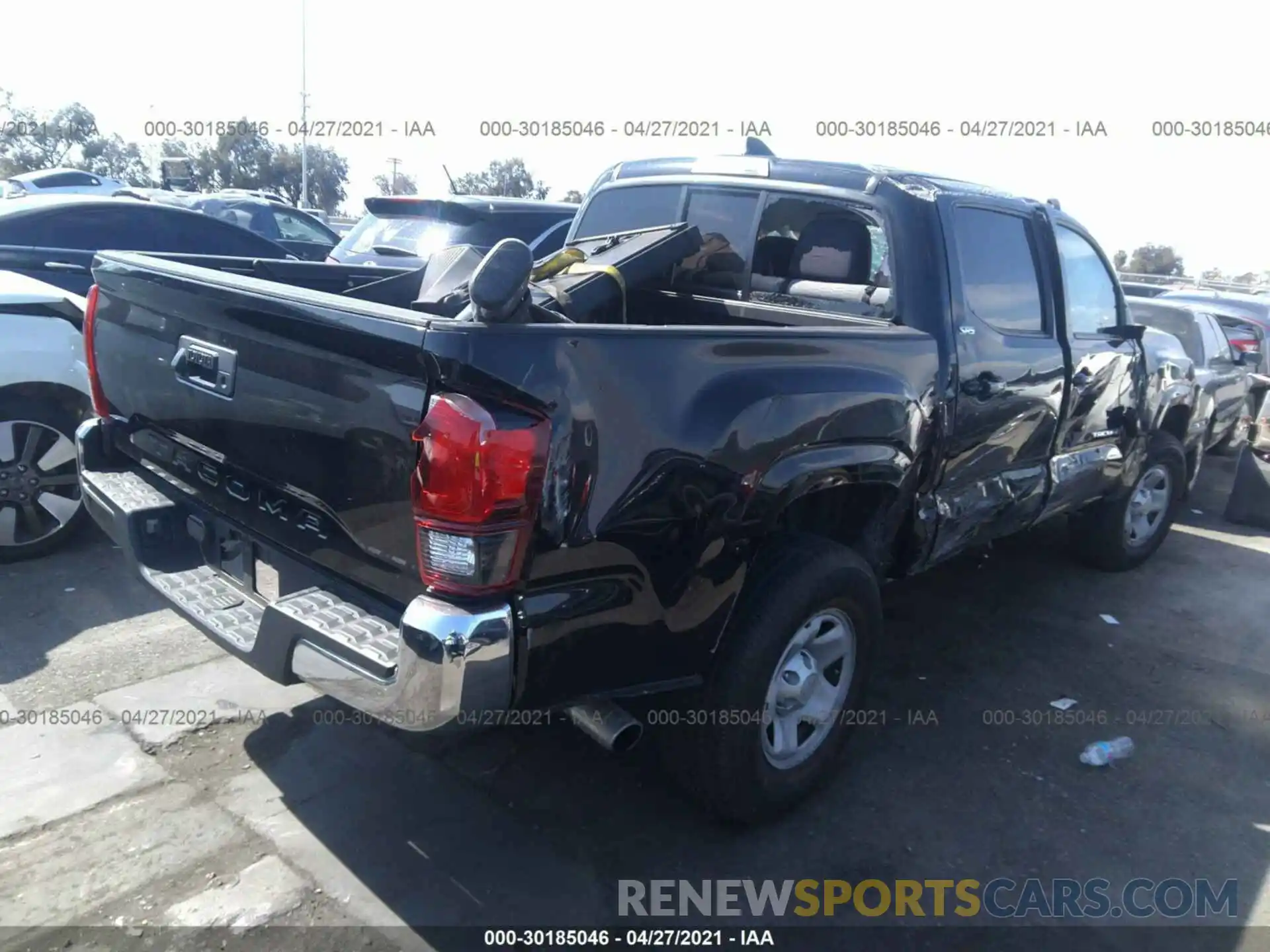 4 Photograph of a damaged car 5TFAX5GN5KX152722 TOYOTA TACOMA 2WD 2019