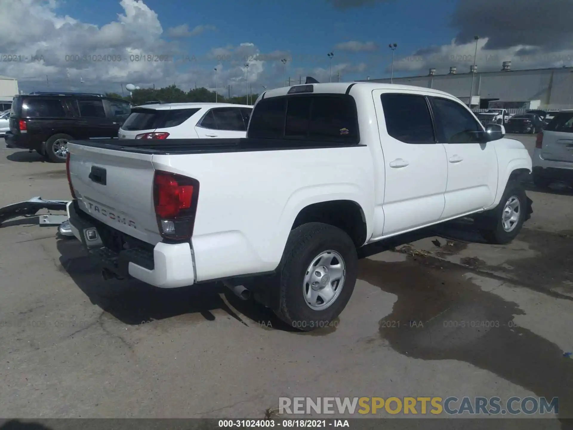 4 Photograph of a damaged car 5TFAX5GN5KX157967 TOYOTA TACOMA 2WD 2019