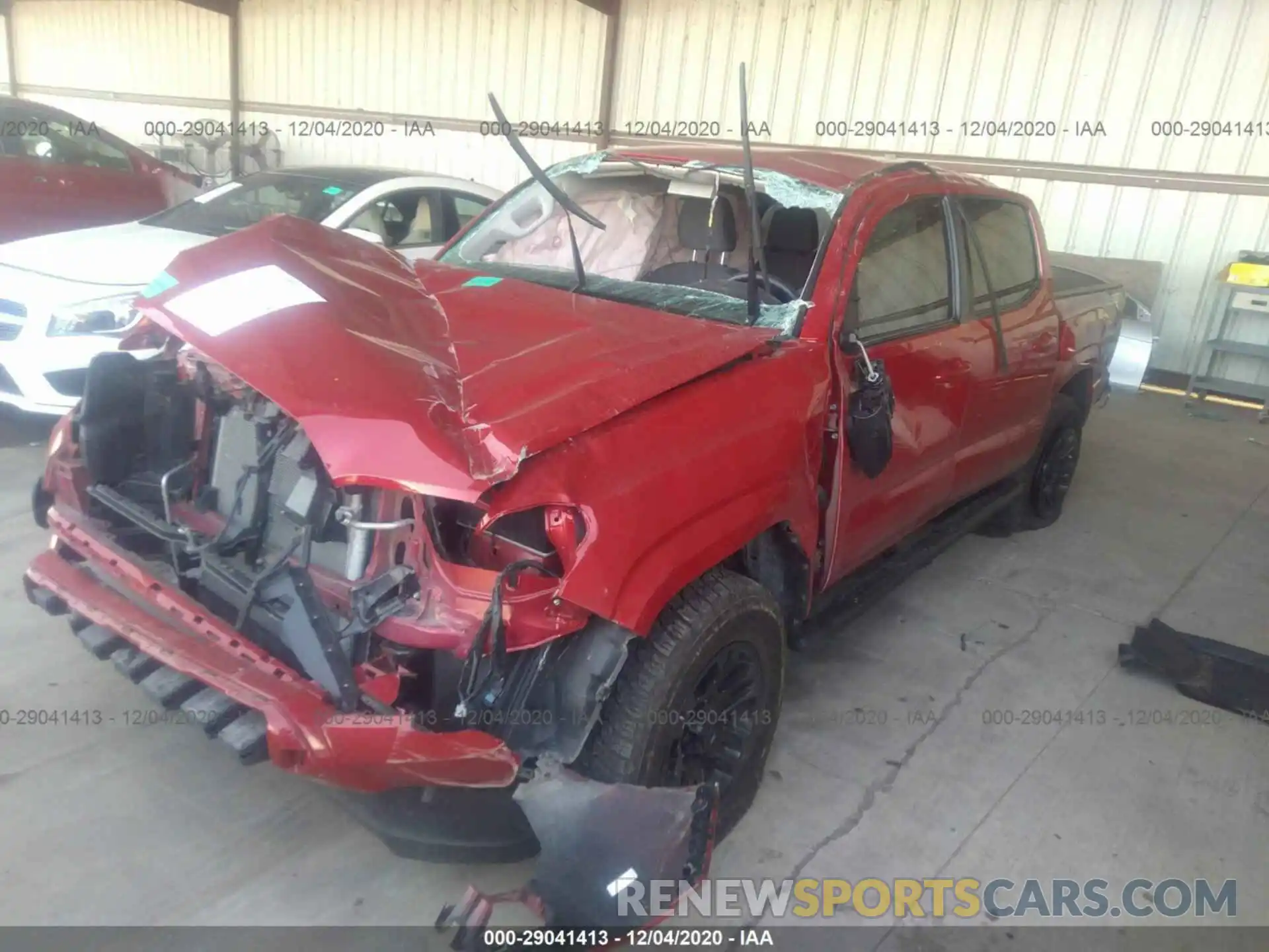 2 Photograph of a damaged car 5TFAX5GN5KX158777 TOYOTA TACOMA 2WD 2019