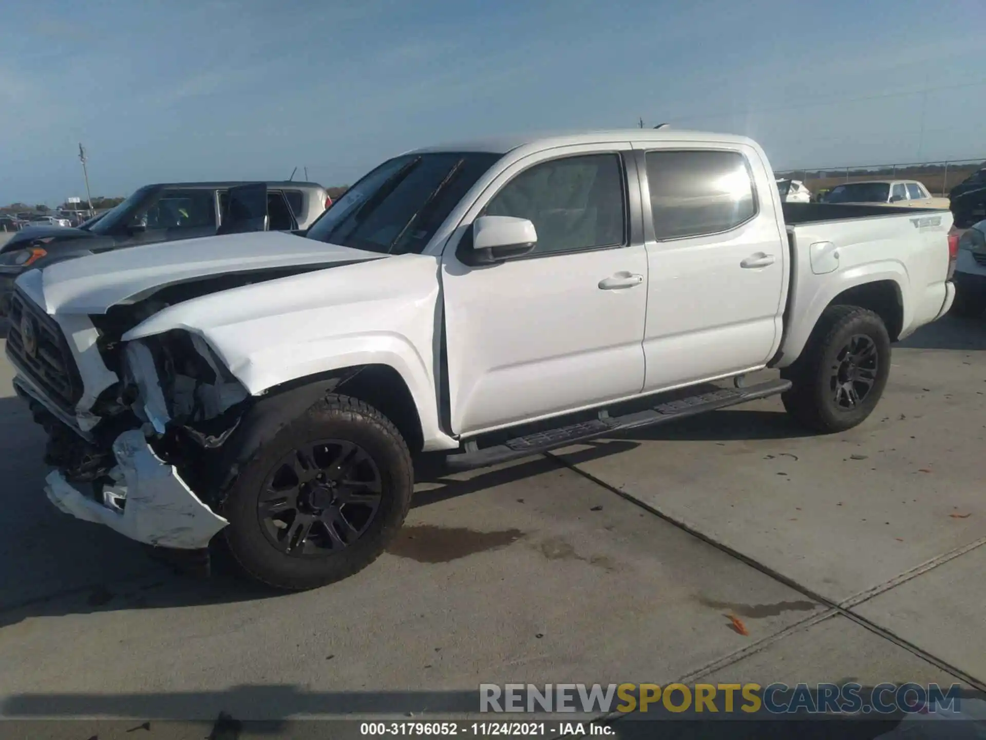 2 Photograph of a damaged car 5TFAX5GN5KX165048 TOYOTA TACOMA 2WD 2019