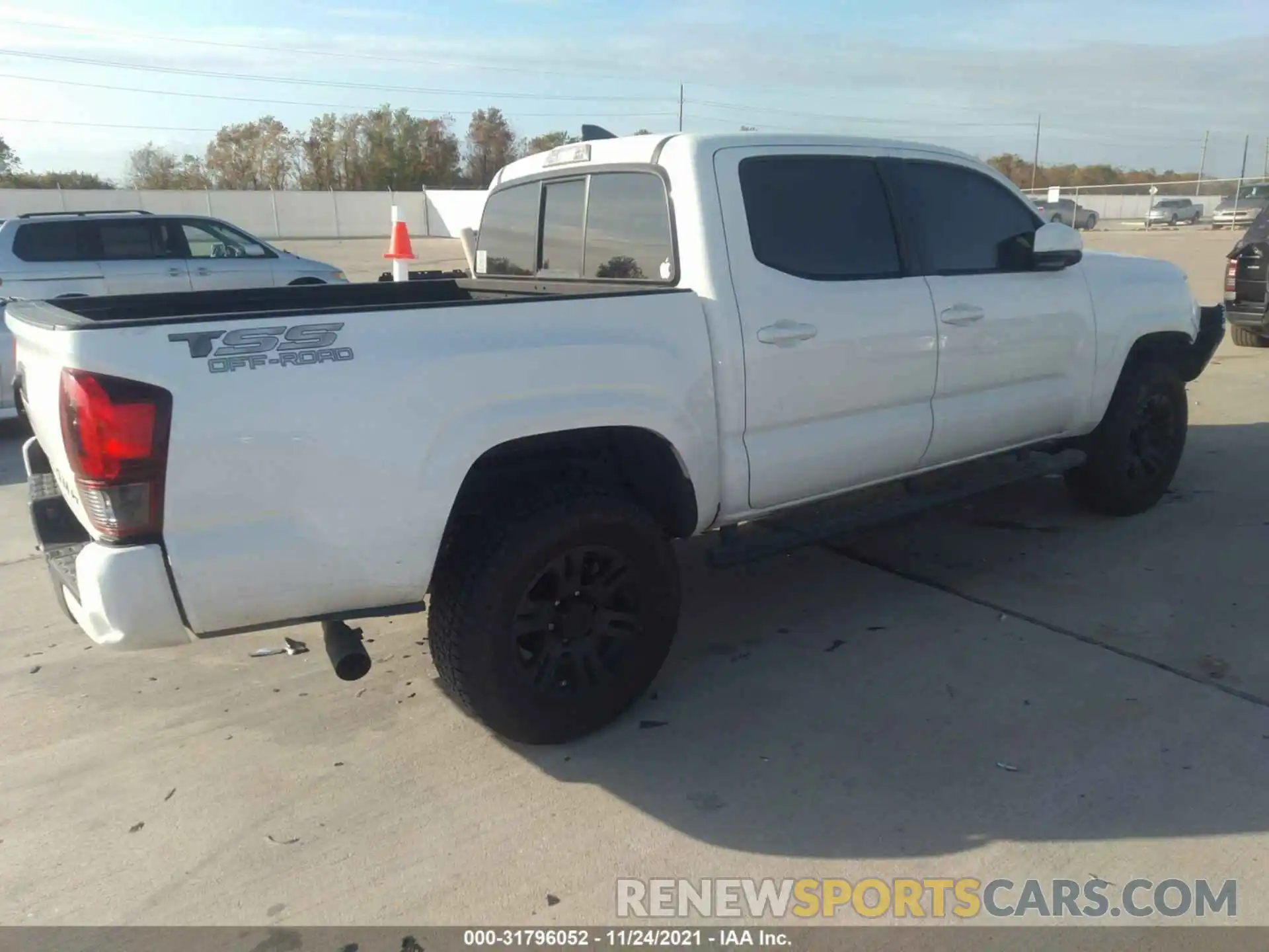 4 Photograph of a damaged car 5TFAX5GN5KX165048 TOYOTA TACOMA 2WD 2019