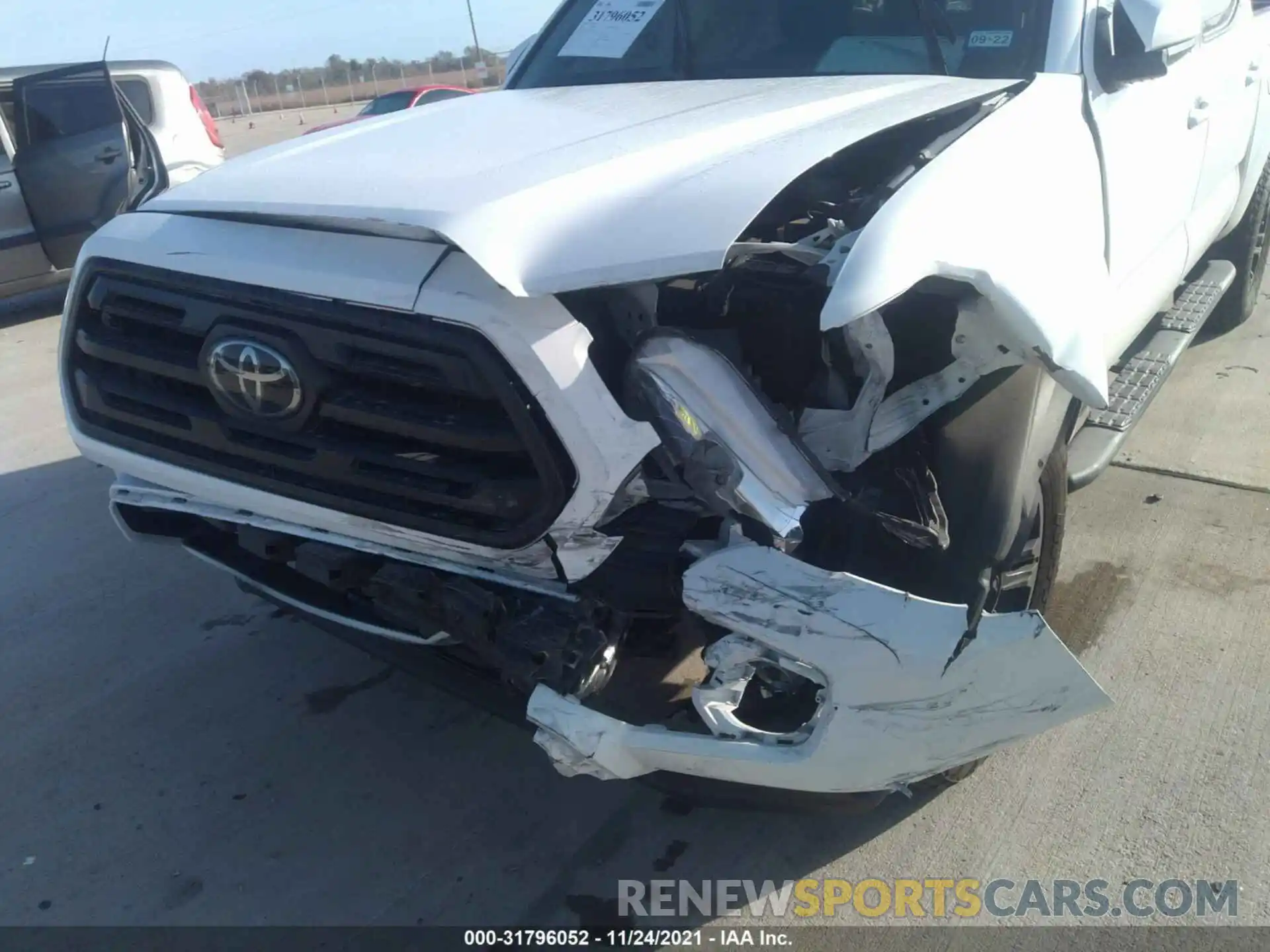 6 Photograph of a damaged car 5TFAX5GN5KX165048 TOYOTA TACOMA 2WD 2019