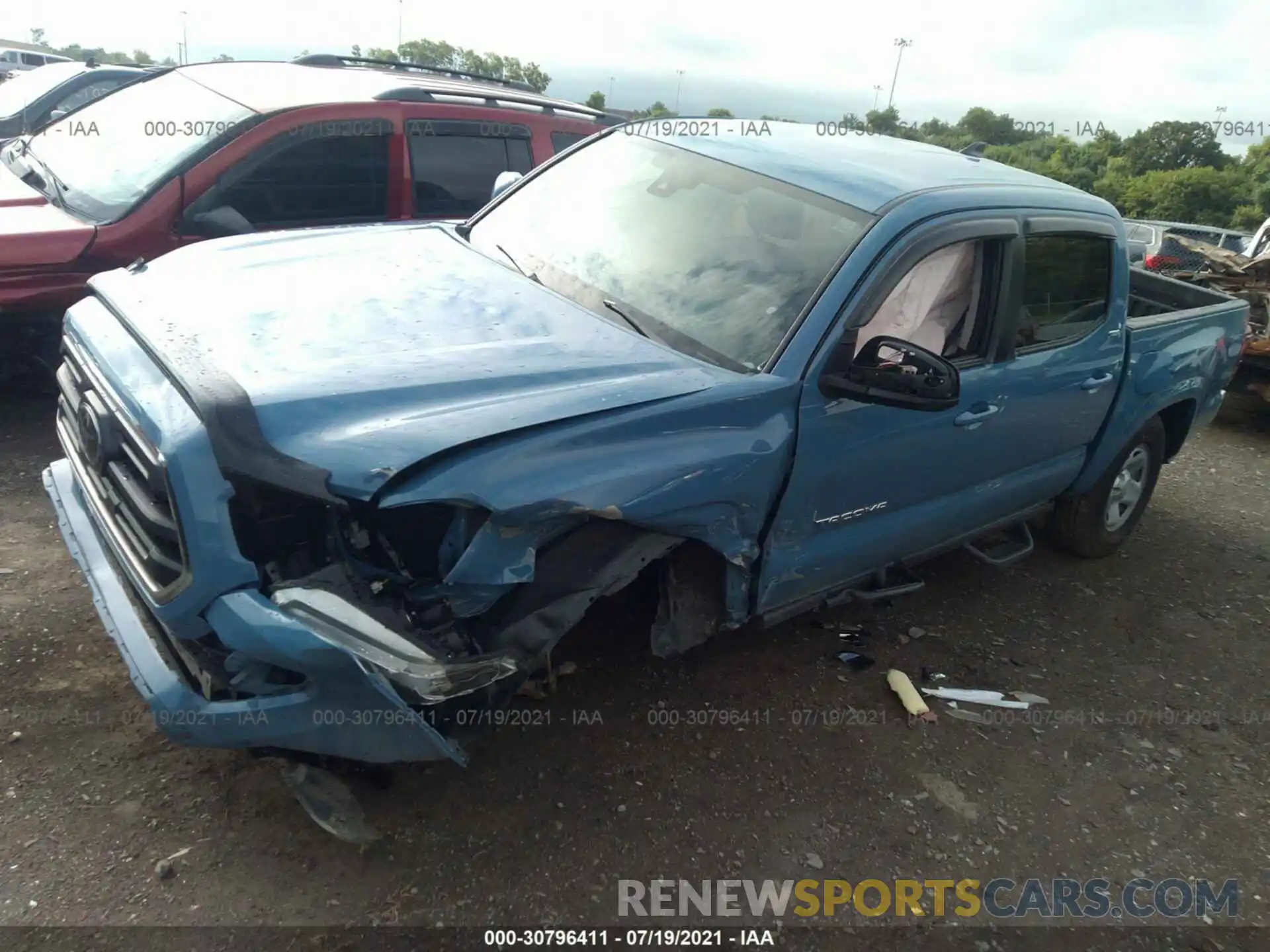 2 Photograph of a damaged car 5TFAX5GN6KX141471 TOYOTA TACOMA 2WD 2019