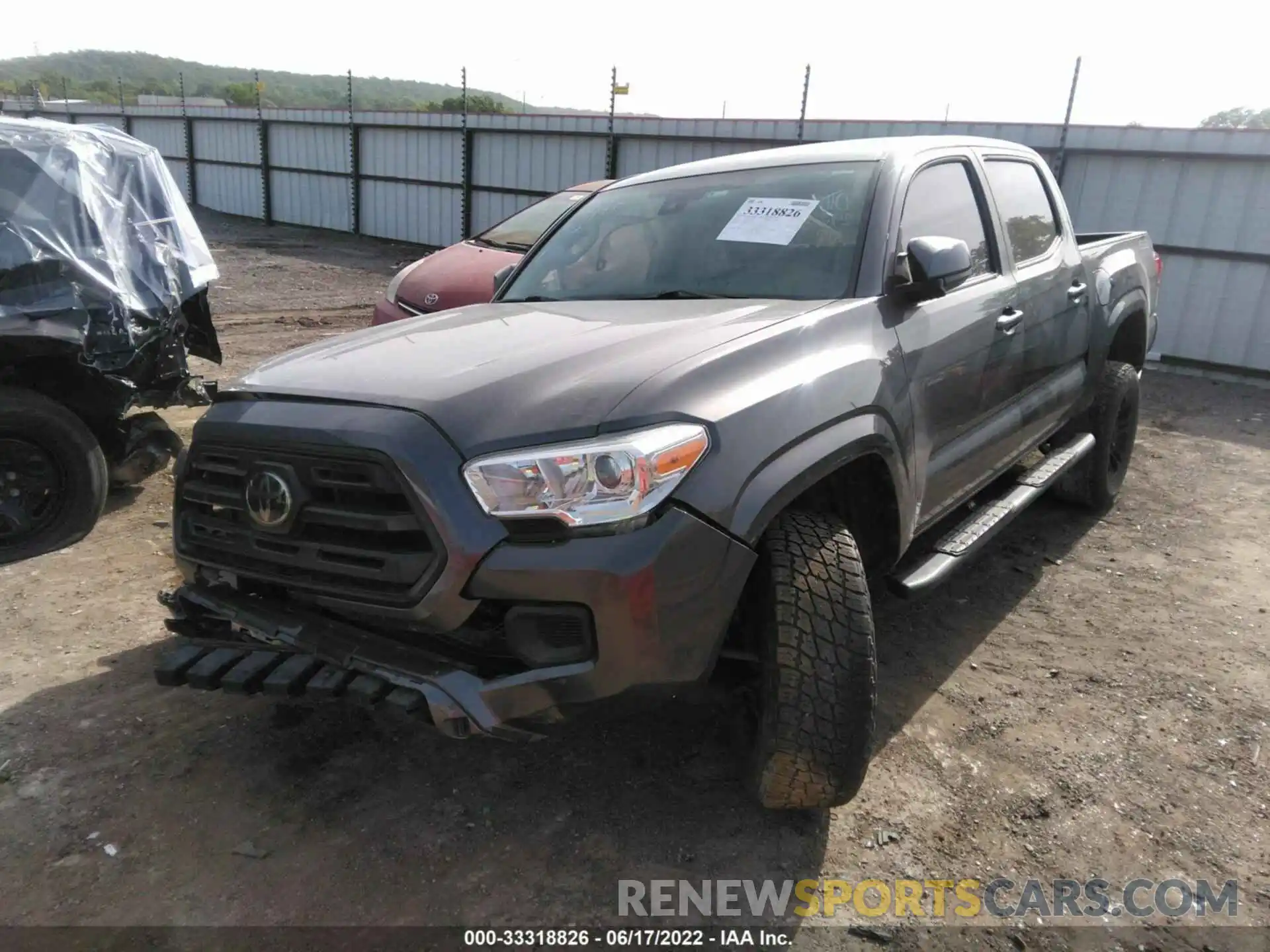 2 Photograph of a damaged car 5TFAX5GN6KX148338 TOYOTA TACOMA 2WD 2019