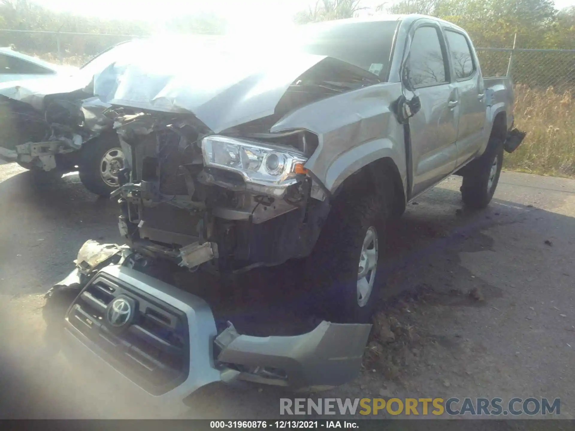 2 Photograph of a damaged car 5TFAX5GN6KX155564 TOYOTA TACOMA 2WD 2019