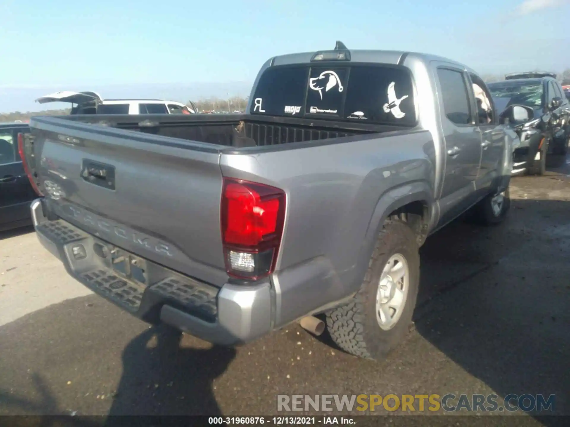 4 Photograph of a damaged car 5TFAX5GN6KX155564 TOYOTA TACOMA 2WD 2019