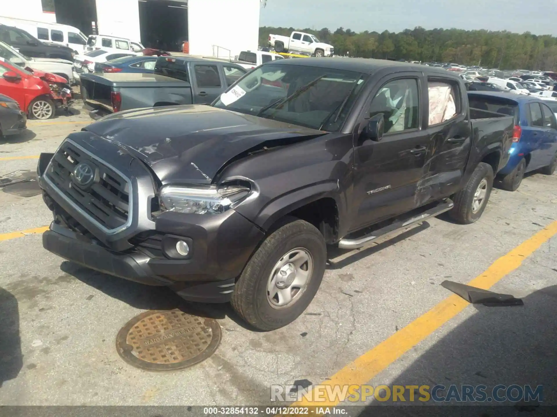 2 Photograph of a damaged car 5TFAX5GN6KX158819 TOYOTA TACOMA 2WD 2019