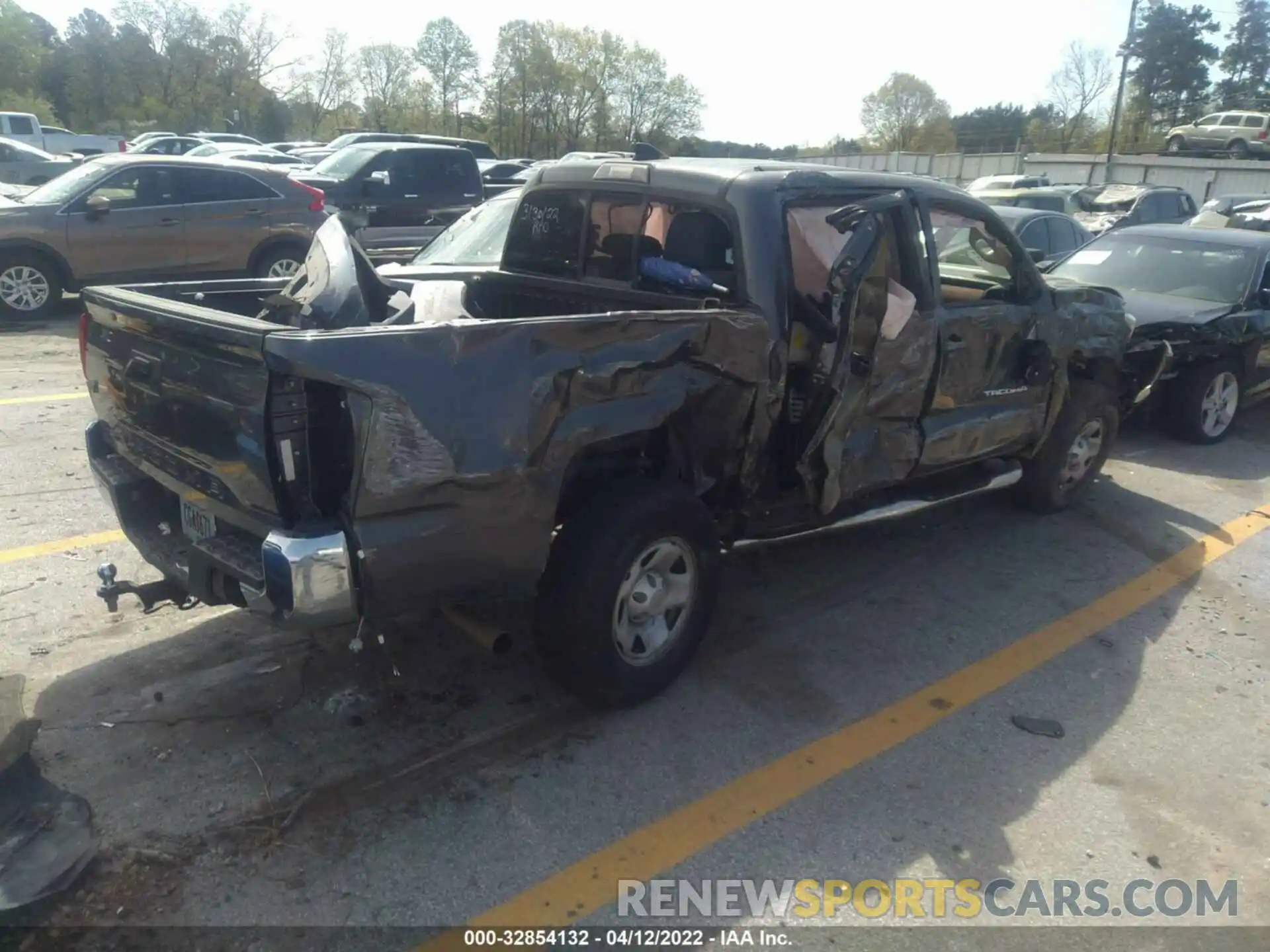 4 Photograph of a damaged car 5TFAX5GN6KX158819 TOYOTA TACOMA 2WD 2019