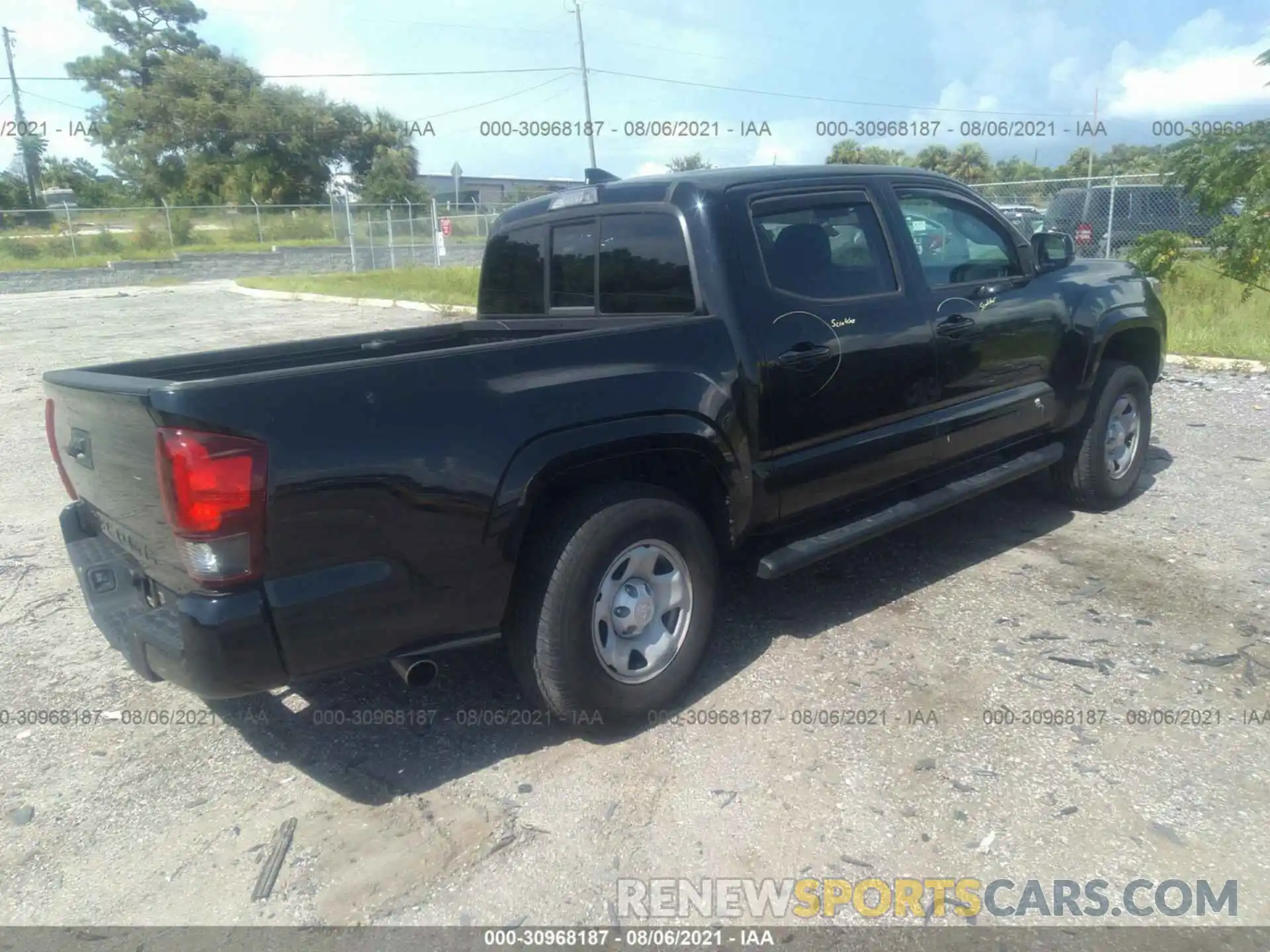 4 Photograph of a damaged car 5TFAX5GN7KX132794 TOYOTA TACOMA 2WD 2019