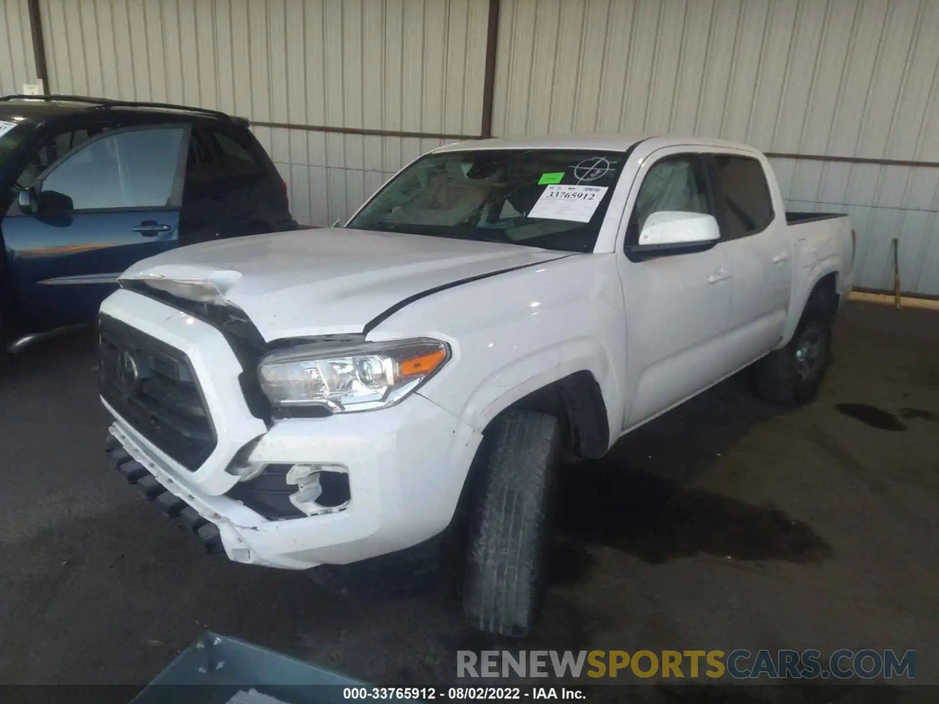 2 Photograph of a damaged car 5TFAX5GN7KX136991 TOYOTA TACOMA 2WD 2019