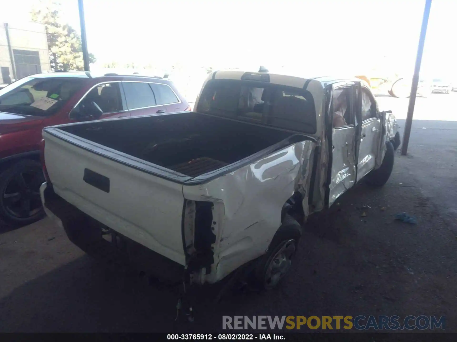 4 Photograph of a damaged car 5TFAX5GN7KX136991 TOYOTA TACOMA 2WD 2019