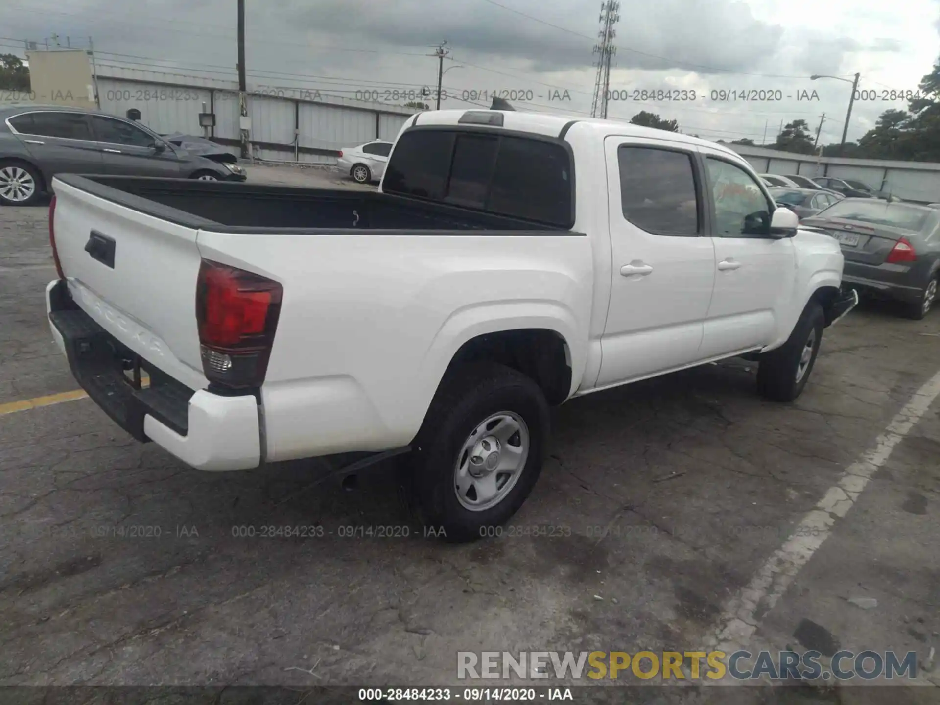 4 Photograph of a damaged car 5TFAX5GN7KX140717 TOYOTA TACOMA 2WD 2019