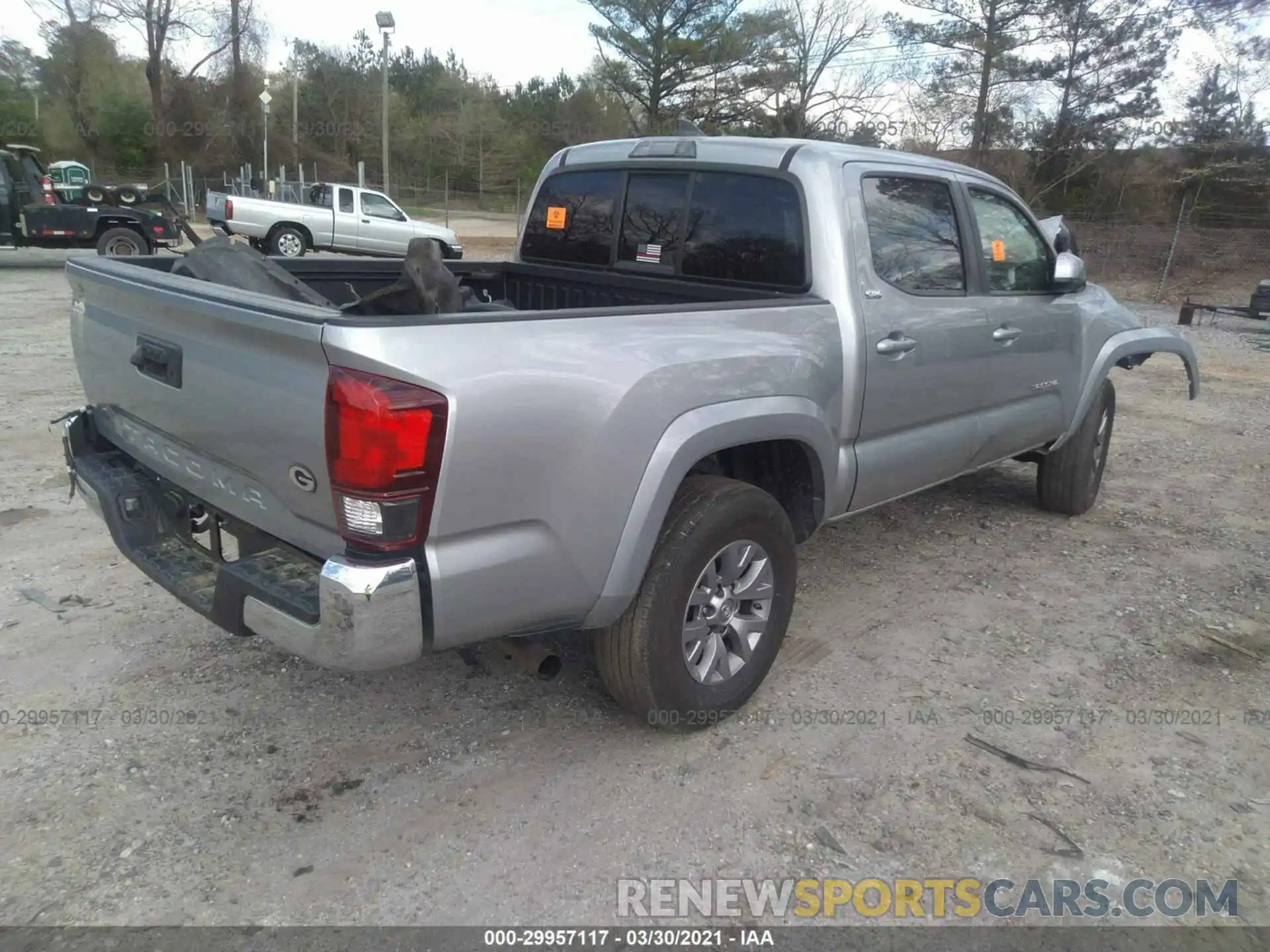 4 Photograph of a damaged car 5TFAX5GN7KX145738 TOYOTA TACOMA 2WD 2019